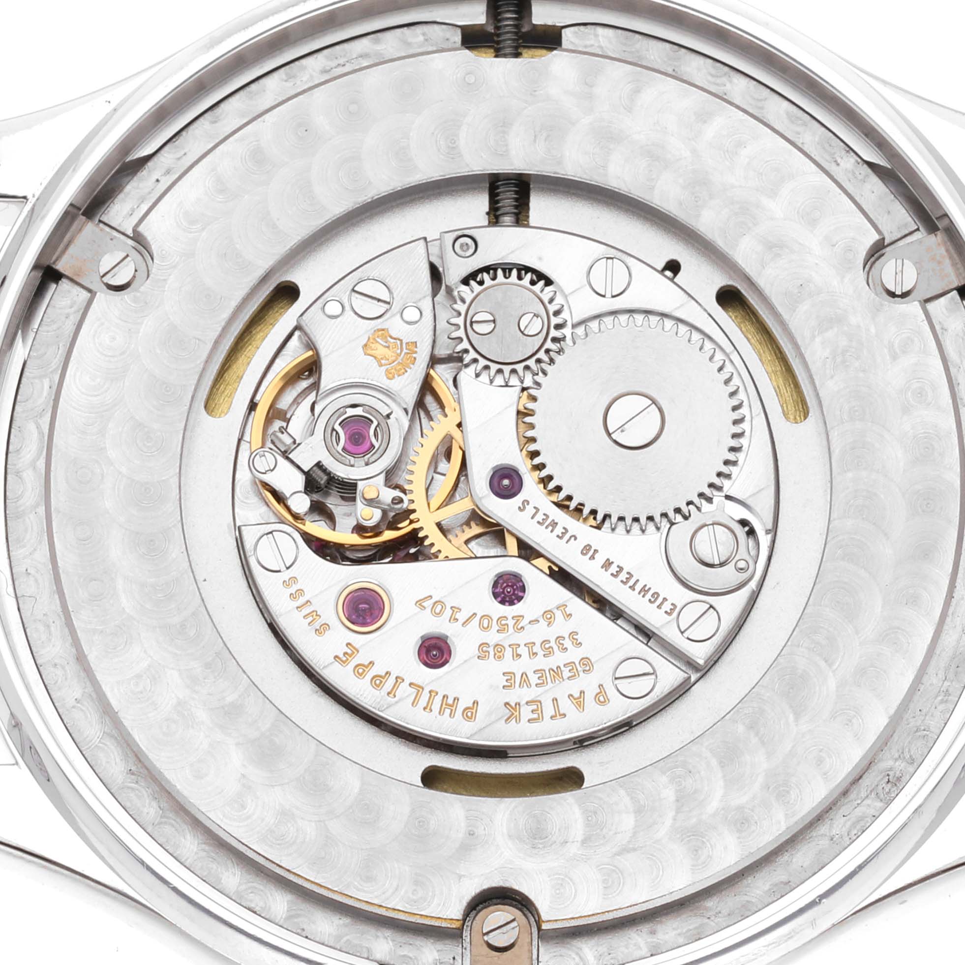 The image shows the intricate mechanical movement of a Patek Philippe Calatrava 4896G Women's White Gold Blue Dial 4896G Women's White Gold Blue Dial watch from the back.