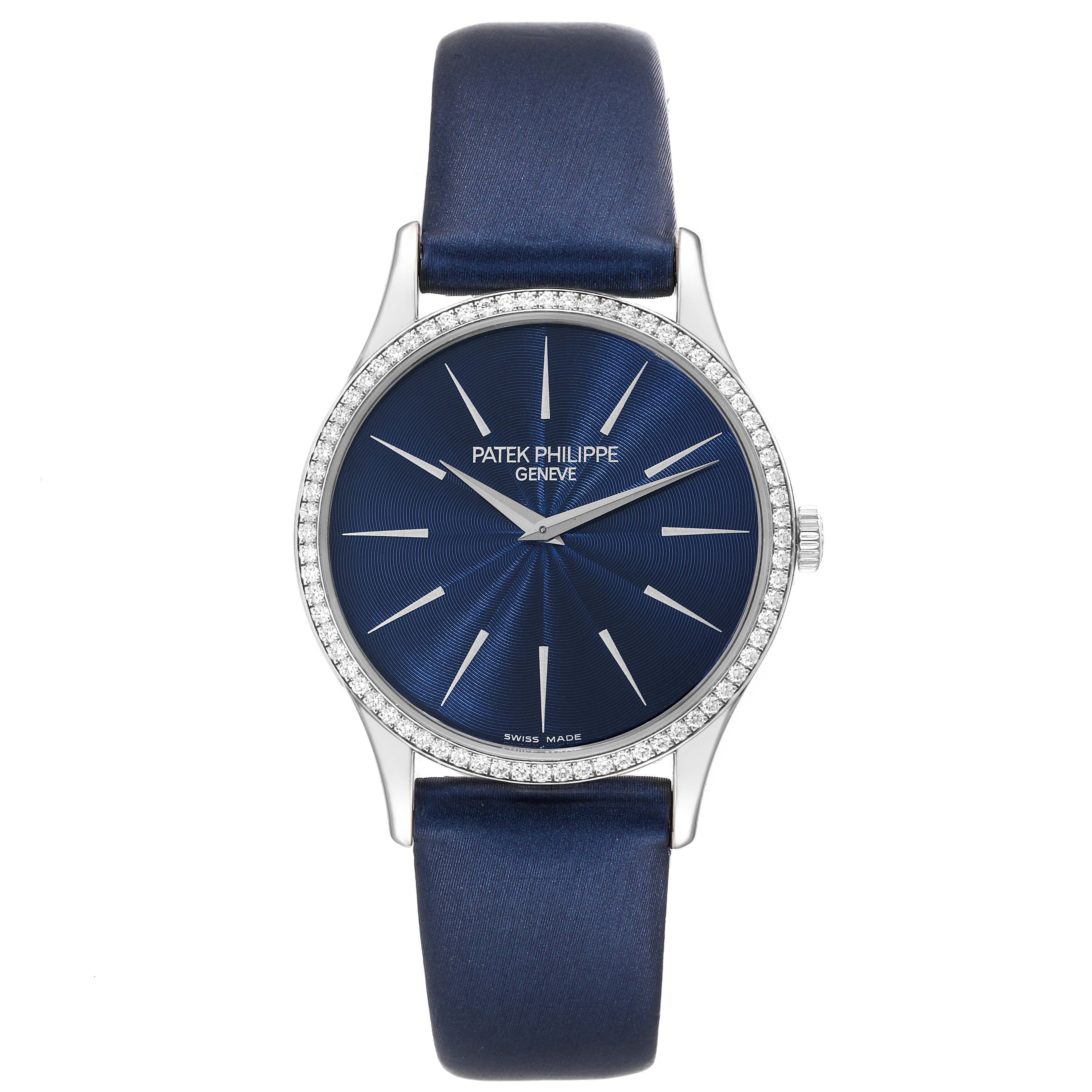 The image shows a frontal view of the Patek Philippe Calatrava 4896G Women's White Gold Blue Dial 4896G Women's White Gold Blue Dial watch featuring a blue dial and strap with a diamond-set bezel.