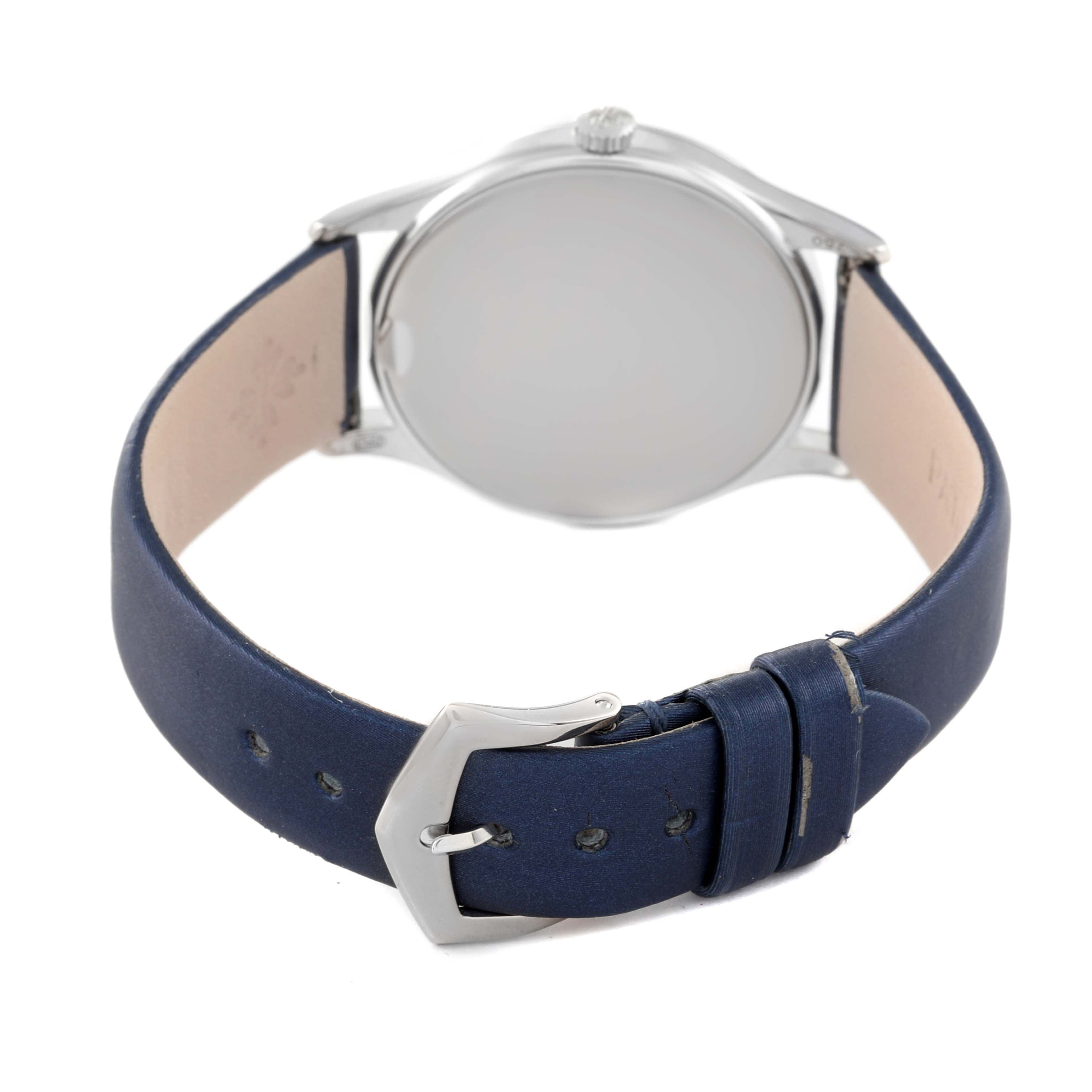 This image shows the back of a Patek Philippe Calatrava 4896G Women's White Gold Blue Dial 4896G Women's White Gold Blue Dial watch including the case and blue leather strap with a buckle.