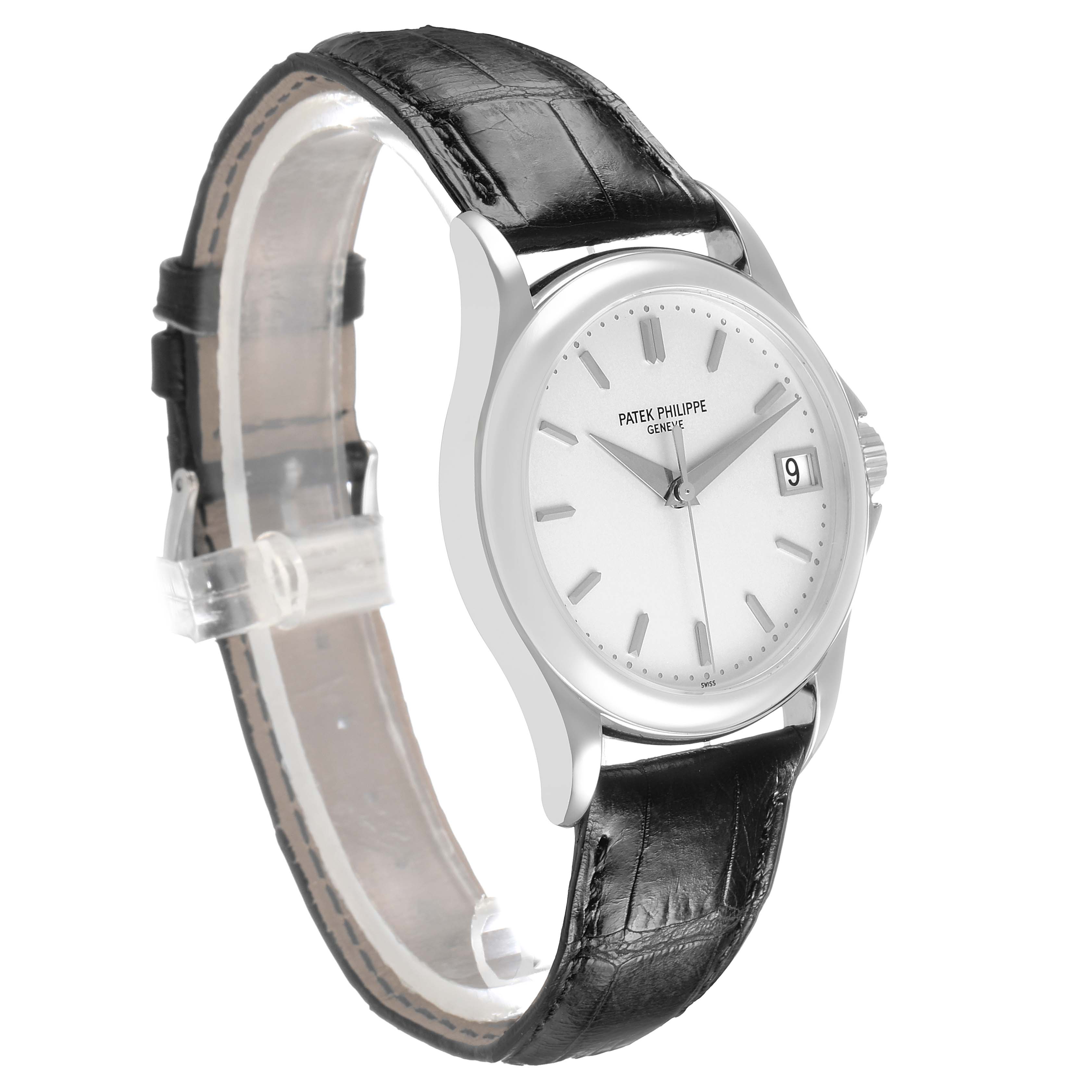 The Patek Philippe Calatrava 5127G-001 Men's White Gold White Dial watch is shown at a three-quarter angle, highlighting the dial, case, and leather strap.