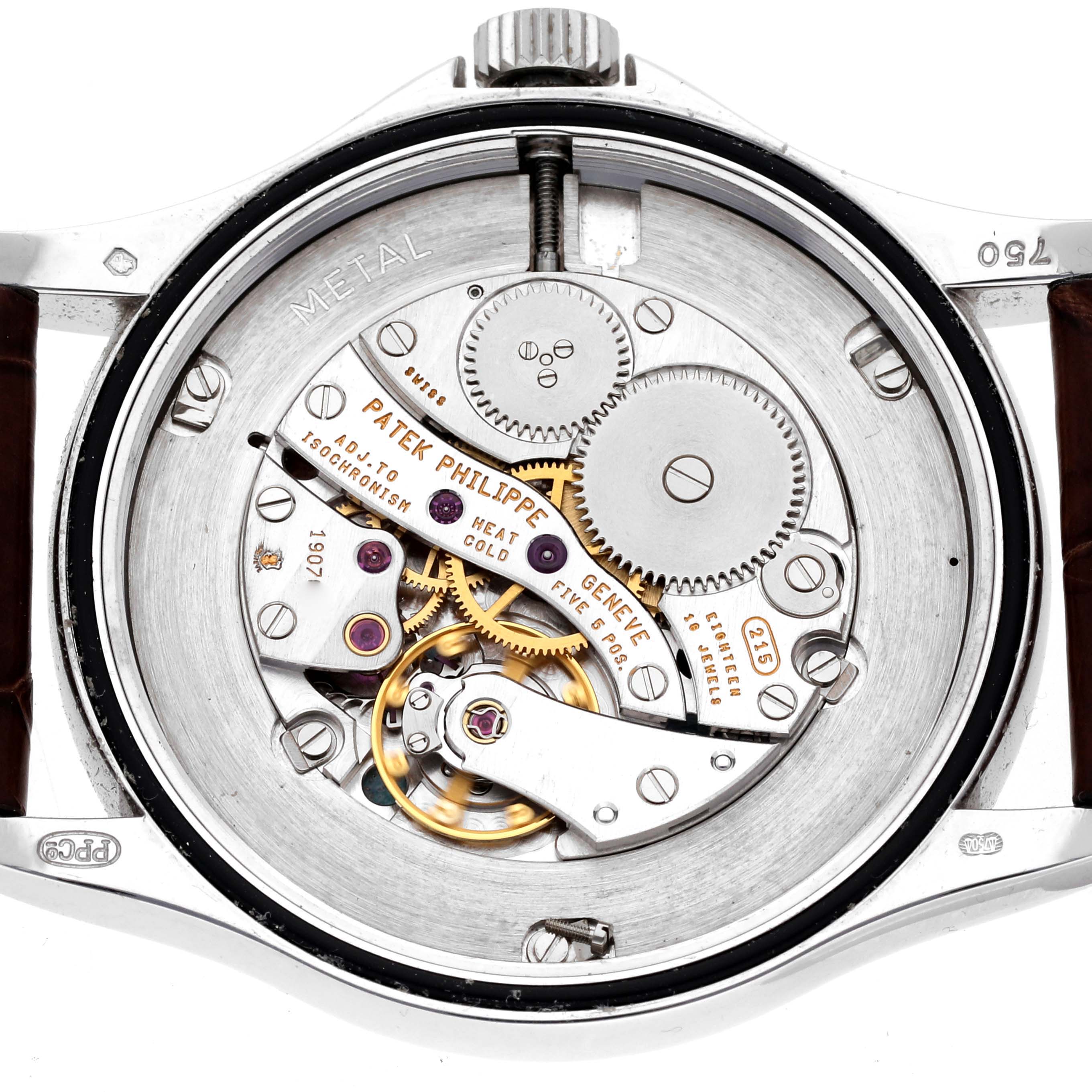 The image shows the intricate inner mechanism of a Patek Philippe Calatrava 5115G Men's White Gold White Dial 5115G Men's White Gold White Dial watch, viewed from the back.