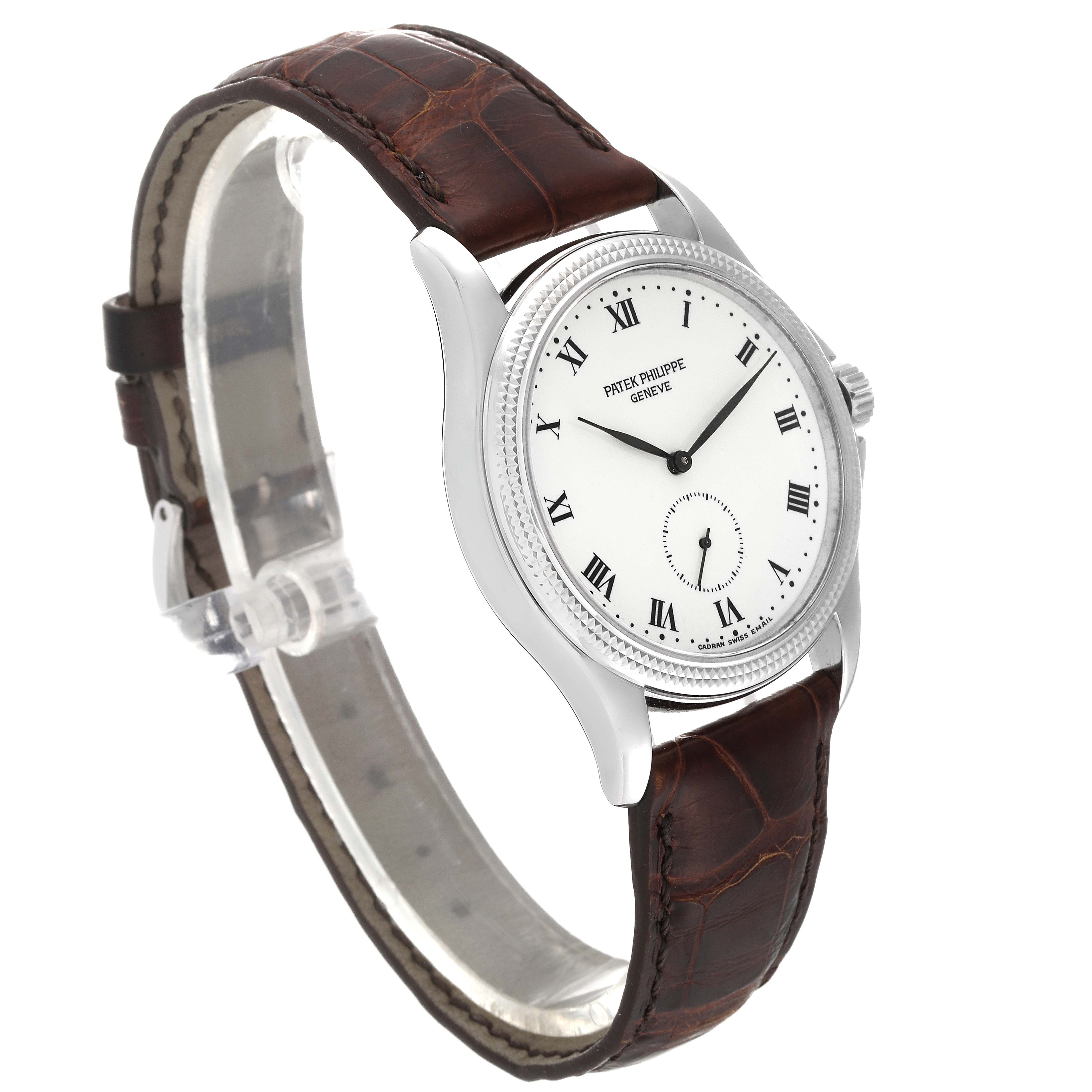 The image shows a side view of a Patek Philippe Calatrava 5115G Men's White Gold White Dial 5115G Men's White Gold White Dial watch, featuring its dial, bezel, and brown leather strap.