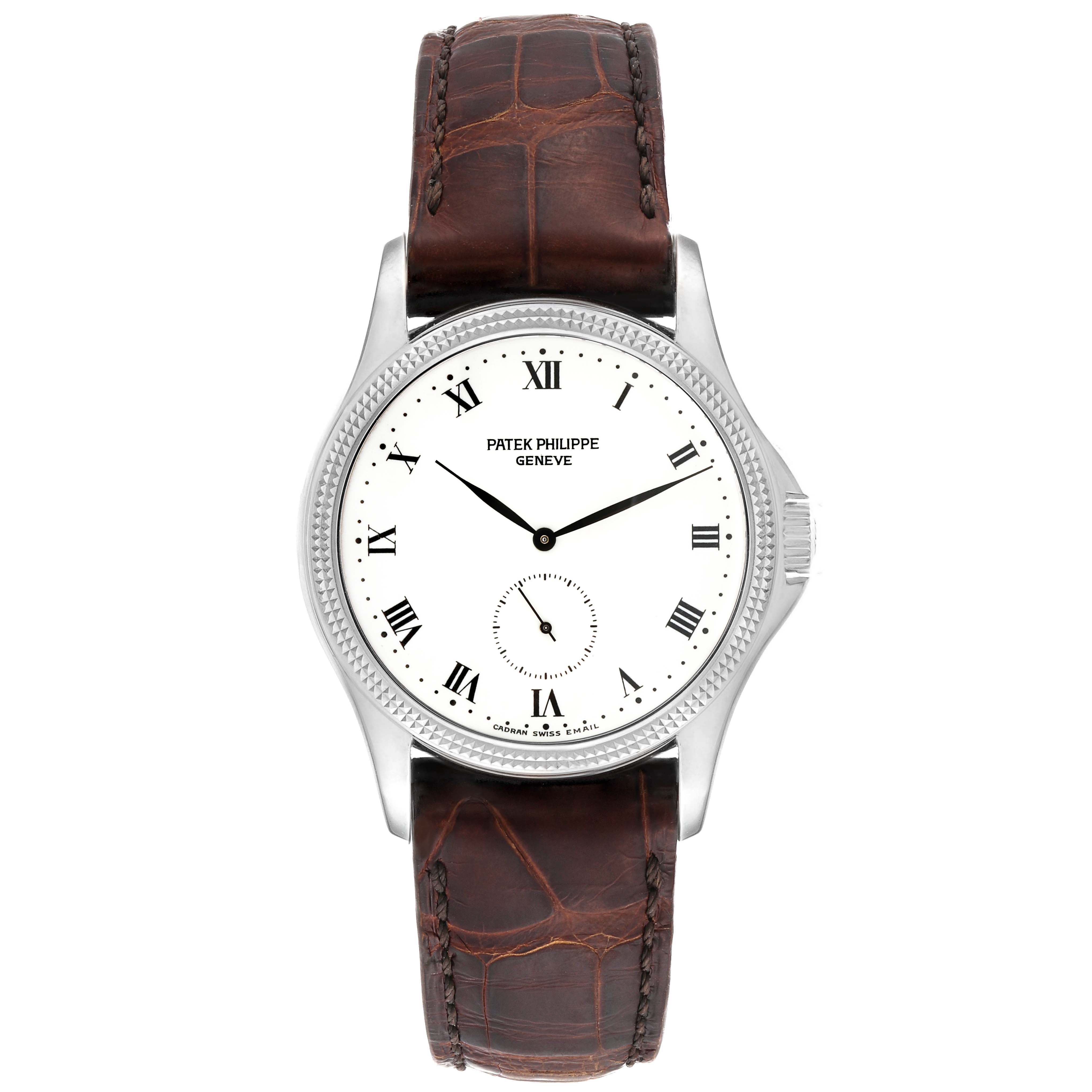 This image shows a front view of the Patek Philippe Calatrava 5115G Men's White Gold White Dial 5115G Men's White Gold White Dial watch with a white dial and brown leather strap.