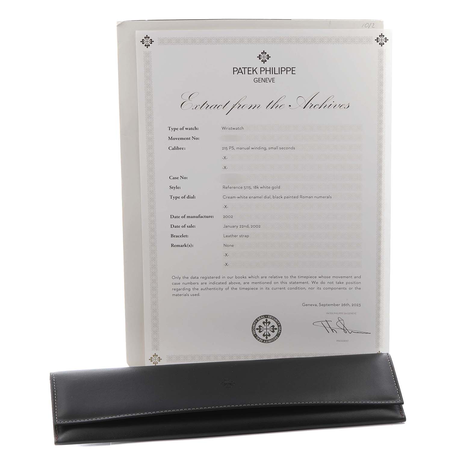 The image shows a document and a leather case for a Patek Philippe Calatrava 5115G Men's White Gold White Dial 5115G Men's White Gold White Dial watch, both laid flat.