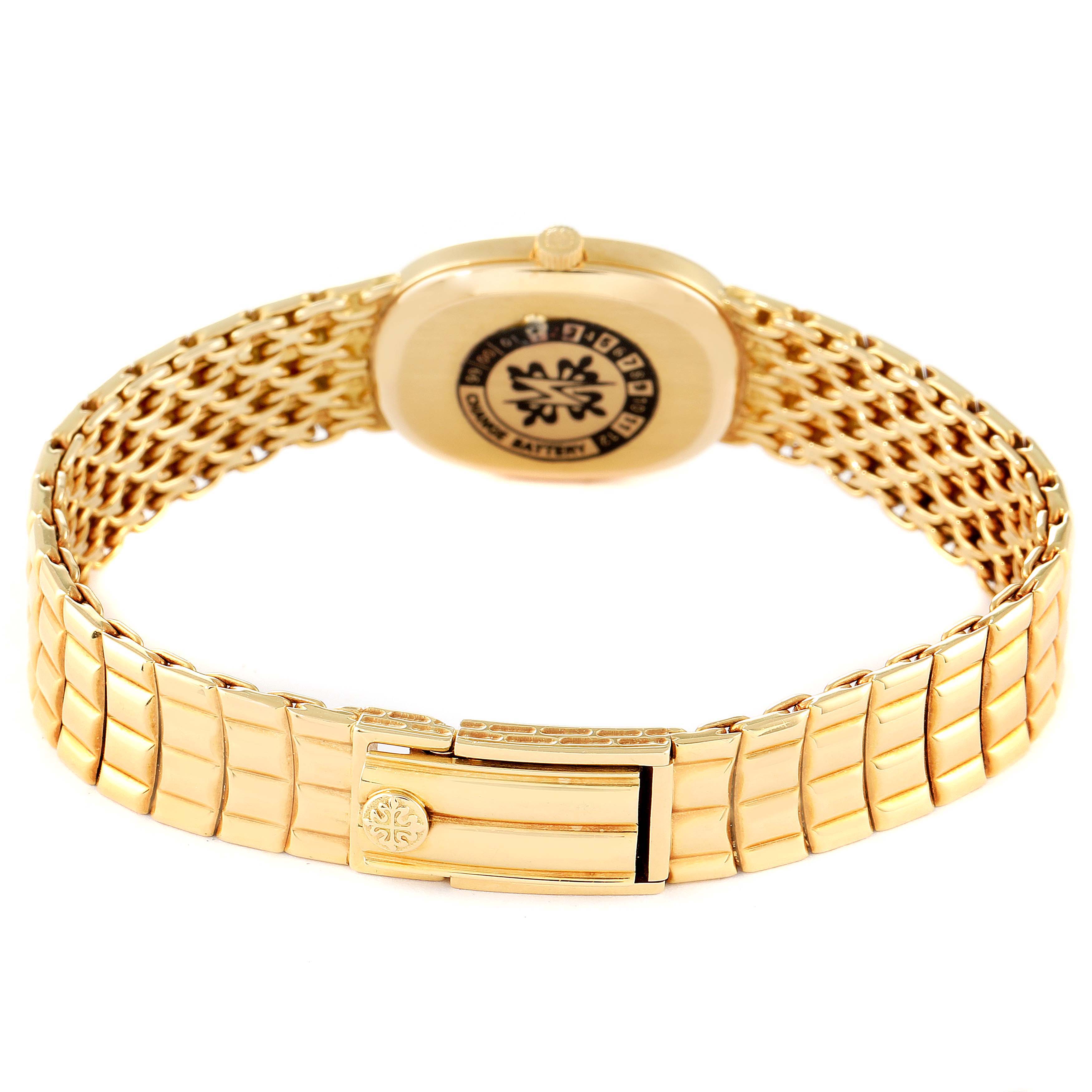 The image shows the back view of a Patek Philippe Golden Ellipse 4764 Women's Yellow Gold Mother of Pearl Dial 4764 Women's Yellow Gold Mother of Pearl Dial watch, including its clasp and bracelet.