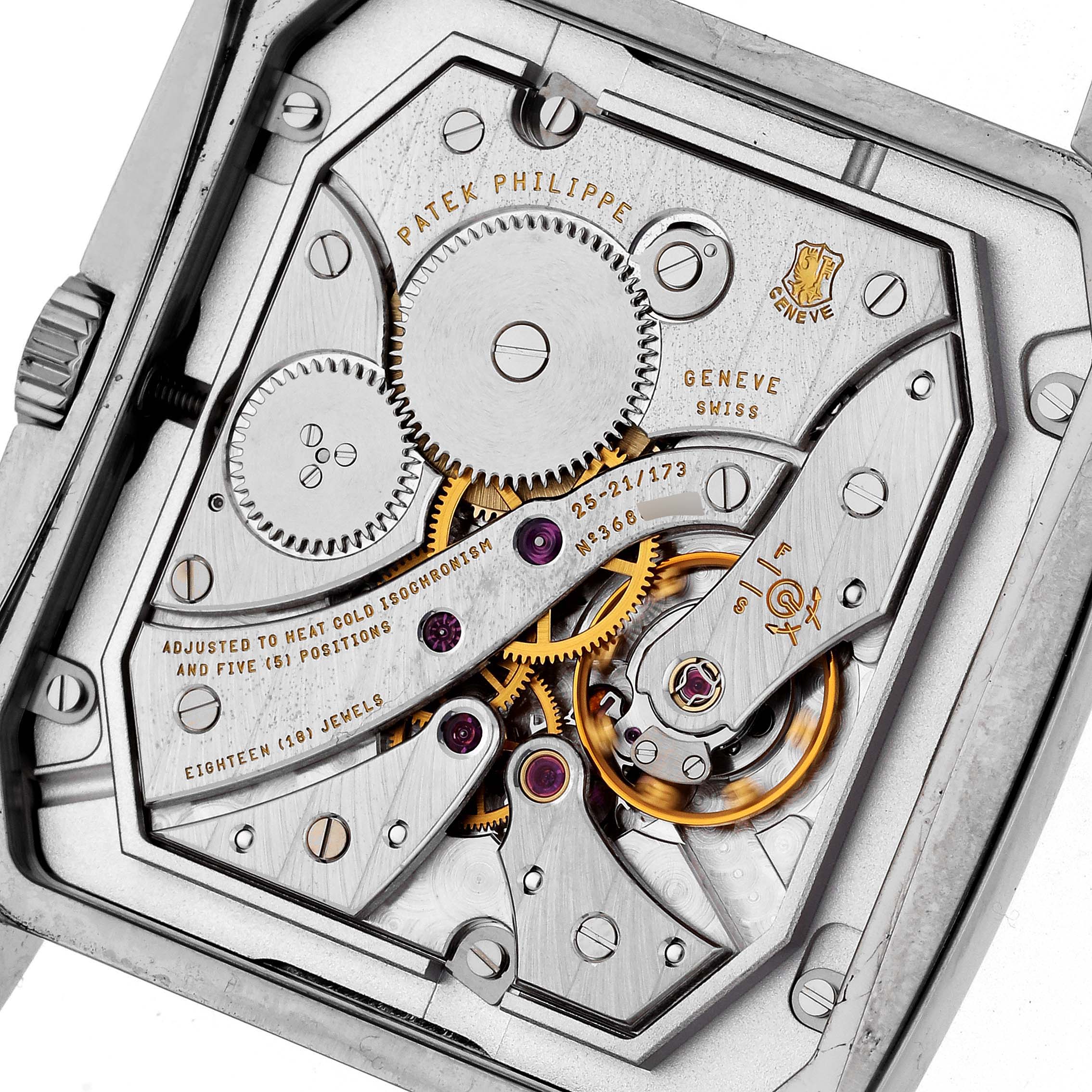 The image shows a close-up of the movement mechanism and gears of a Patek Philippe Gondolo 5124G-001 Men's White Gold Brown Dial 5124G-001 Men's White Gold Brown Dial watch.