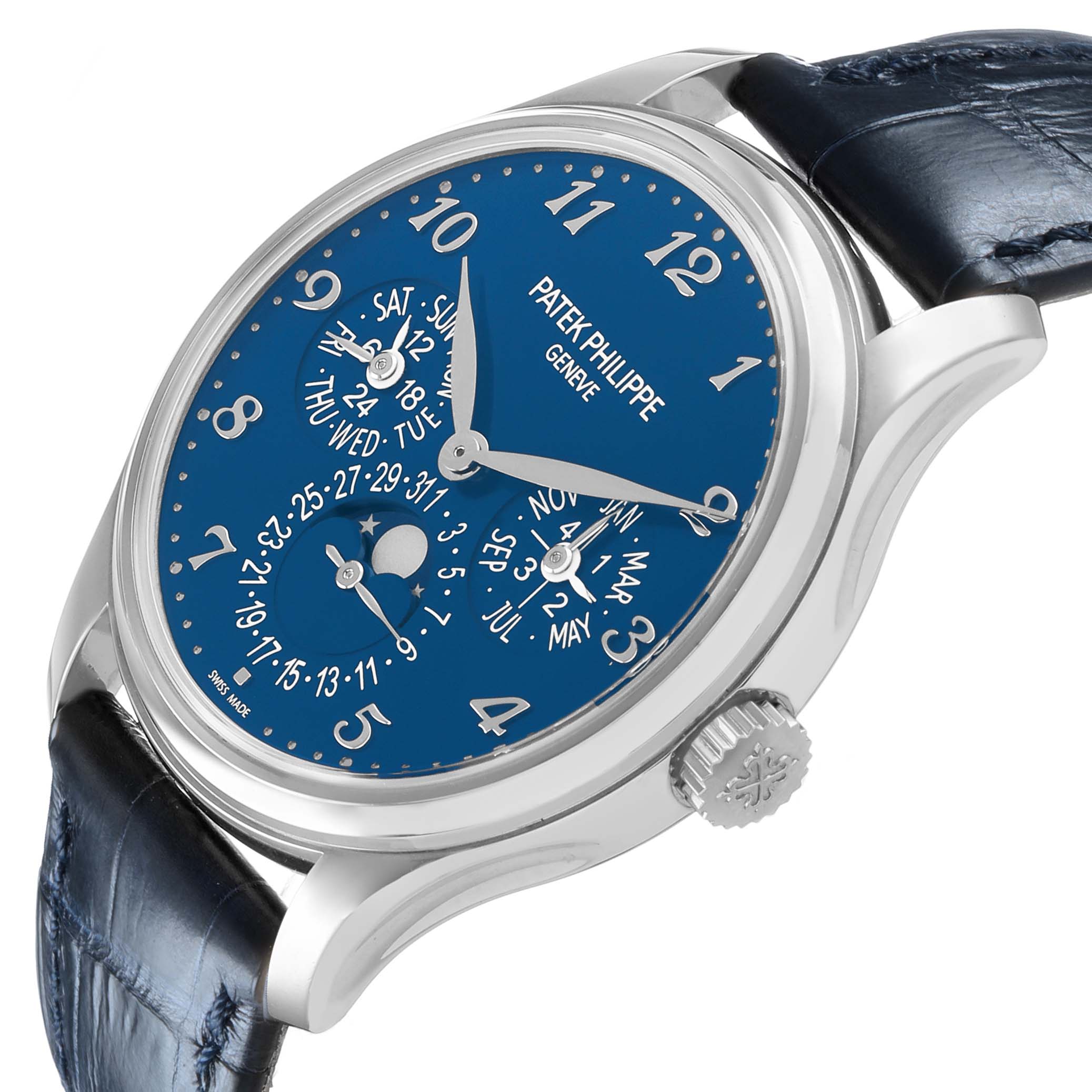The Patek Philippe Complications 5327G Men's White Gold Blue Dial watch is shown from a three-quarter angle, displaying the blue dial, subdials, and crown with a leather strap.