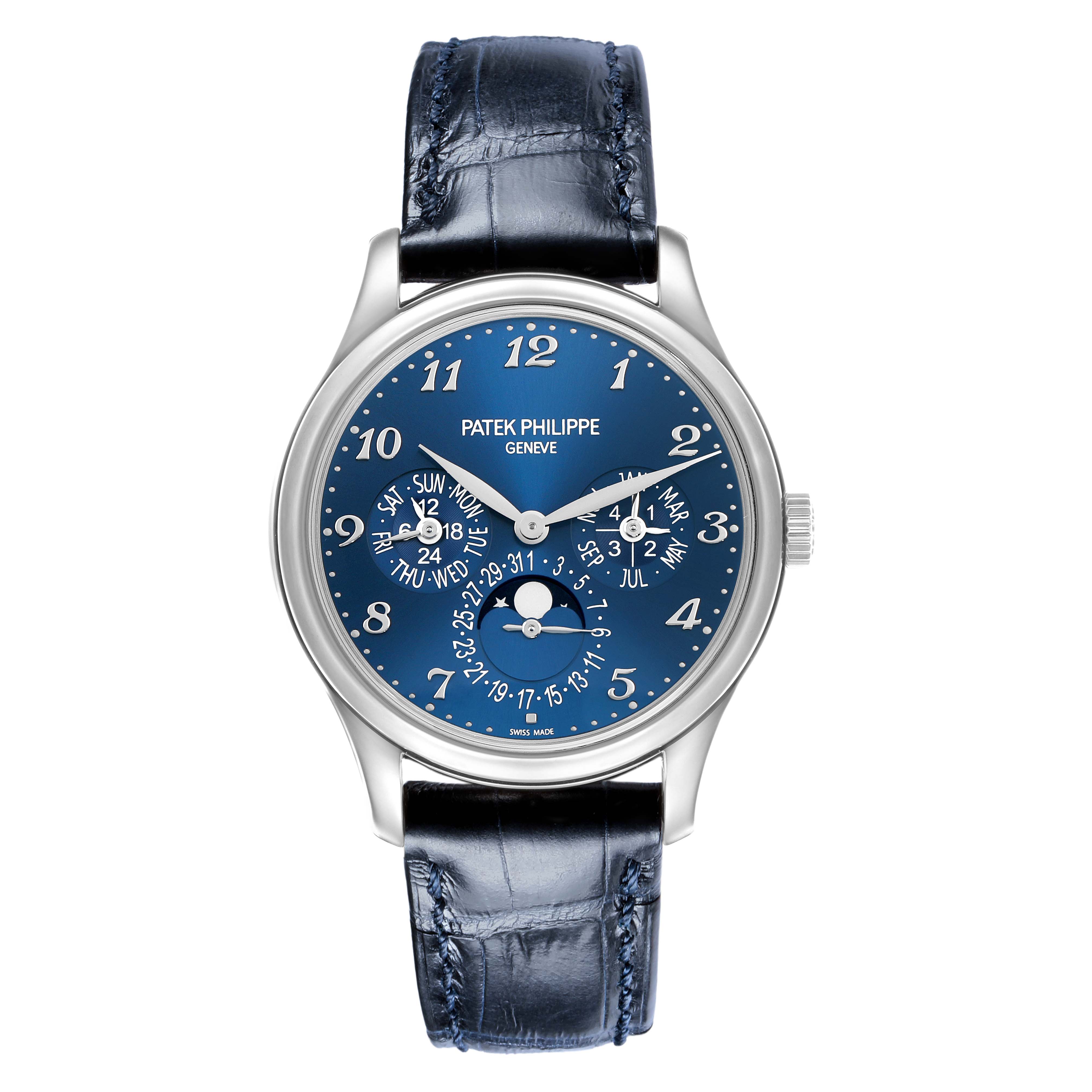 The Patek Philippe Complications 5327G Men's White Gold Blue Dial watch is shown from a front angle, highlighting its blue dial, complications, and leather strap.