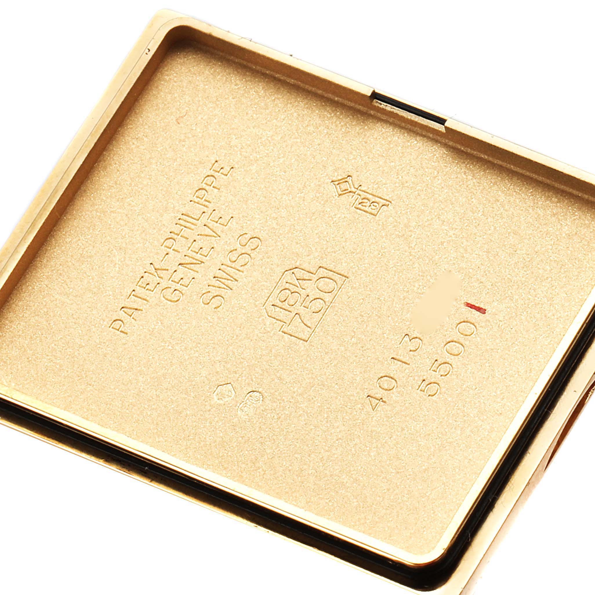 This image shows the back cover of the Patek Philippe Pagoda 5500 Men's Yellow Gold Champagne Dial 5500 Men's Yellow Gold Champagne Dial Yellow Gold Limited Edition Men's Watch 5500J, viewed from an interior angle.