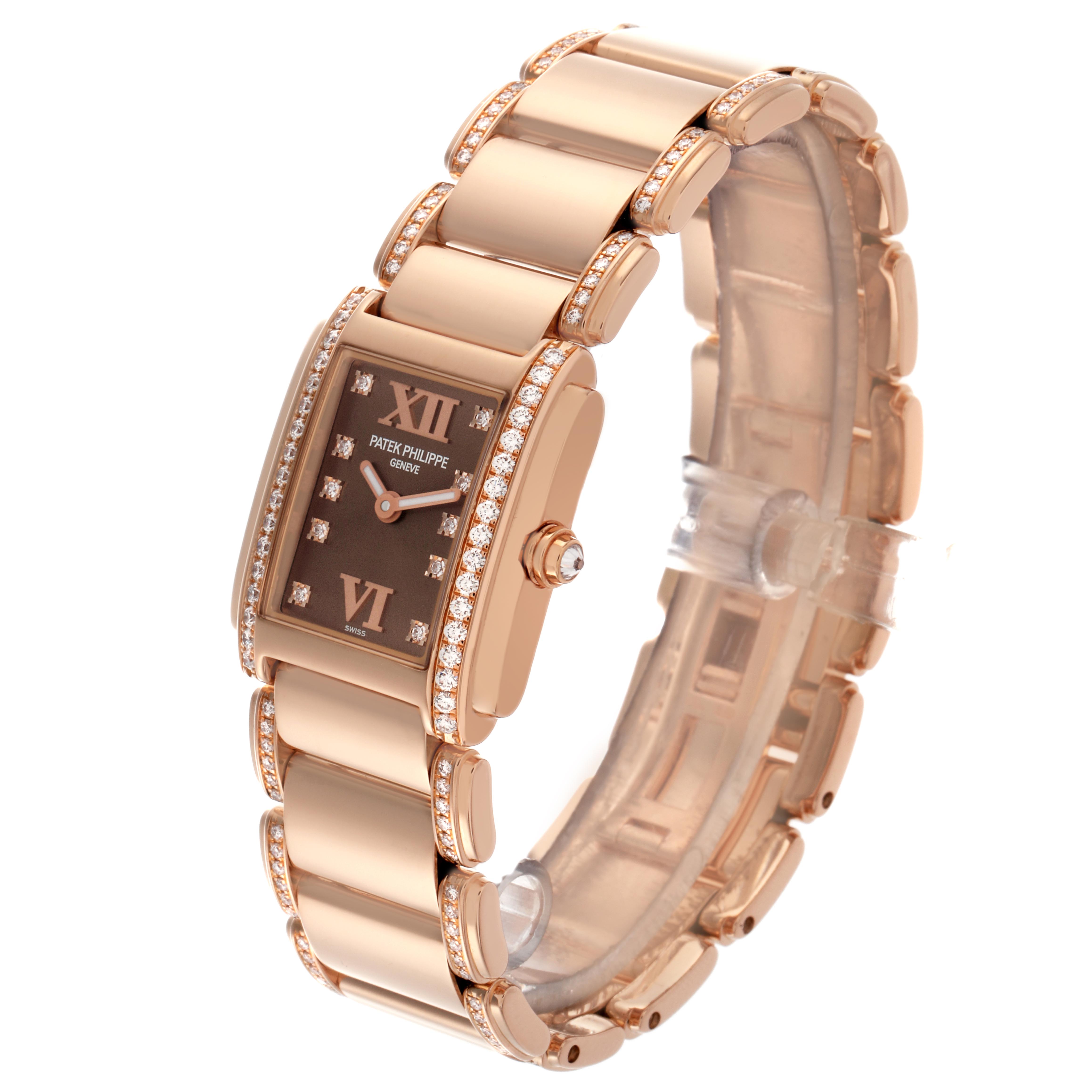 The Patek Philippe Twenty-4 4908/30R Women
s Rose Gold Brown Dial 4908/30R Women
s Rose Gold Brown Dial watch is shown at a three-quarter angle, displaying its diamond-set bezel, dial, and linked bracelet.