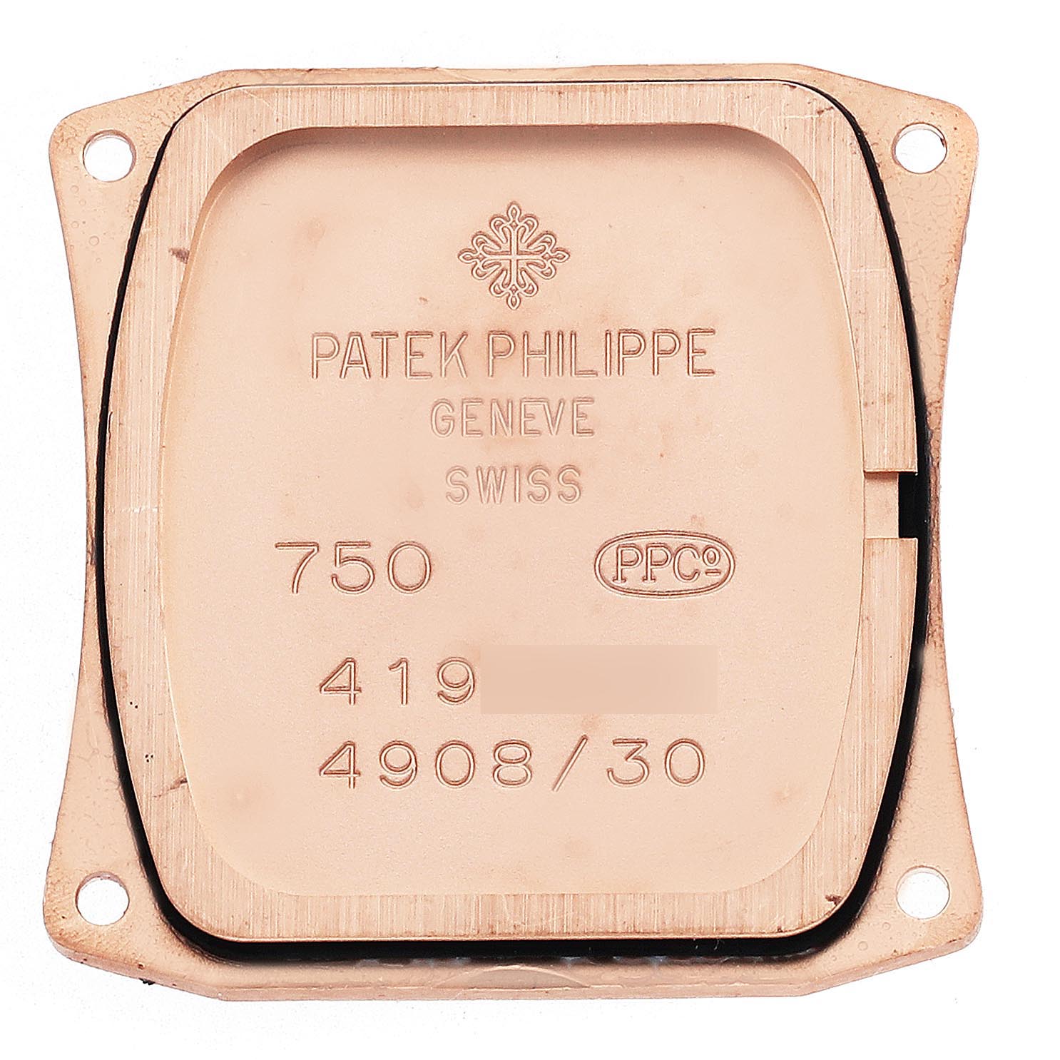 The image shows the back case of a Patek Philippe Twenty-4 4908/30R Women
s Rose Gold Brown Dial 4908/30R Women
s Rose Gold Brown Dial watch, featuring engravings and markings.