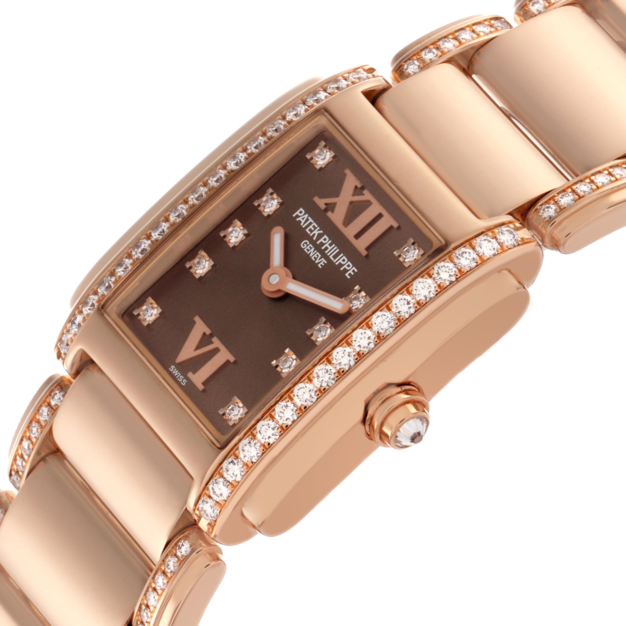 The Patek Philippe Twenty-4 4908/30R Women
s Rose Gold Brown Dial 4908/30R Women
s Rose Gold Brown Dial watch is shown at an oblique angle, highlighting the diamond-set bezel and dial details.