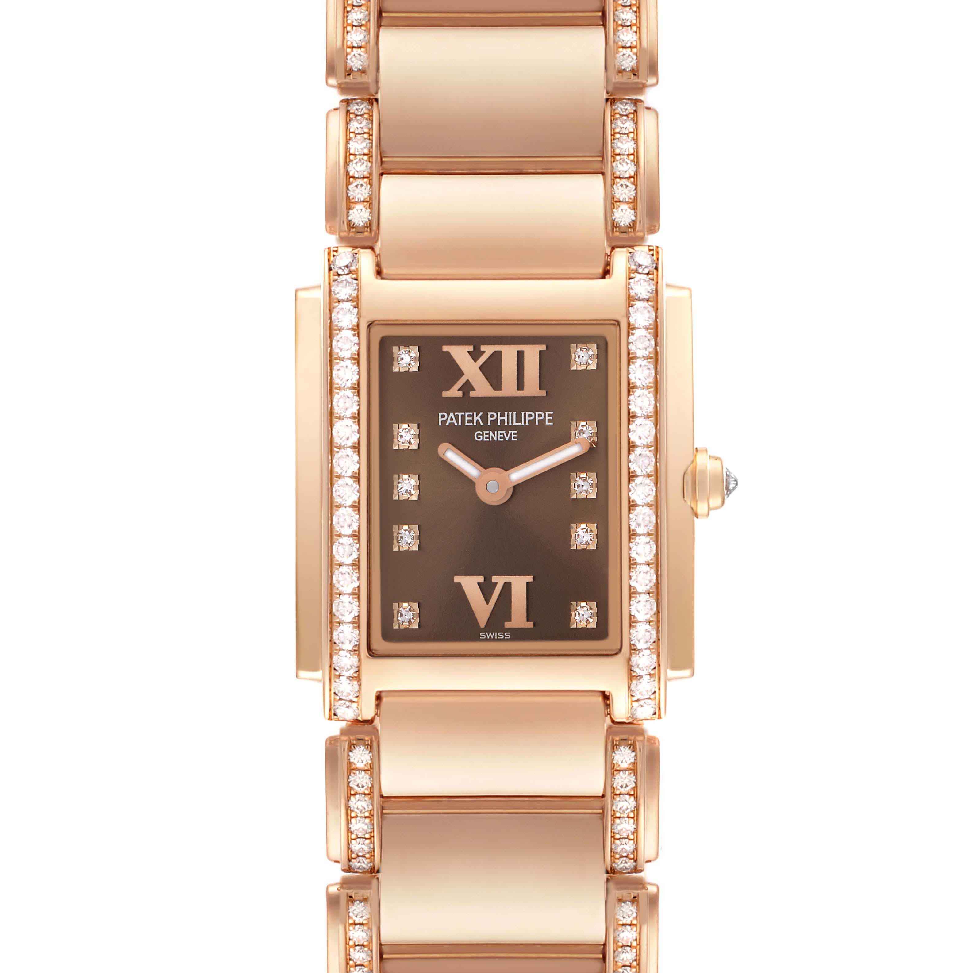 The Patek Philippe Twenty-4 4908/30R Women
s Rose Gold Brown Dial 4908/30R Women
s Rose Gold Brown Dial watch is shown from a top-down angle, featuring the face, bezel, and part of the bracelet.