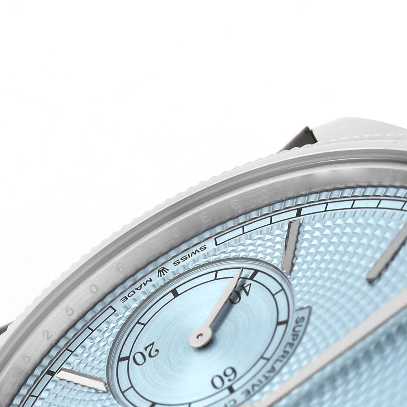 The image shows a close-up of the dial and bezel of a Rolex 1908 52506 Men's Platinum Blue Dial model, highlighting the textured face and hour markers.