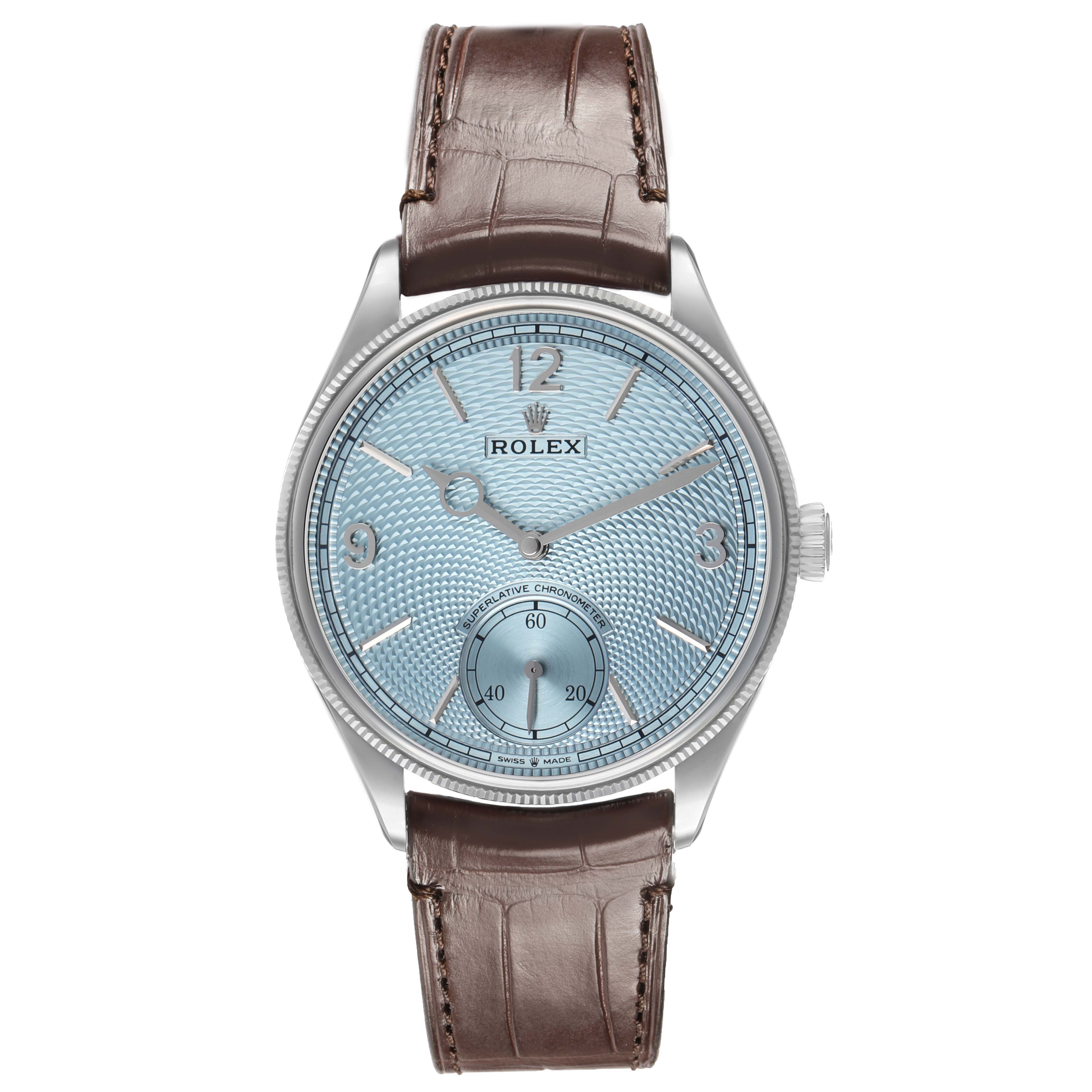 The Rolex 1908 52506 Men's Platinum Blue Dial model is shown from the front, displaying its dial, hands, case, and leather strap.