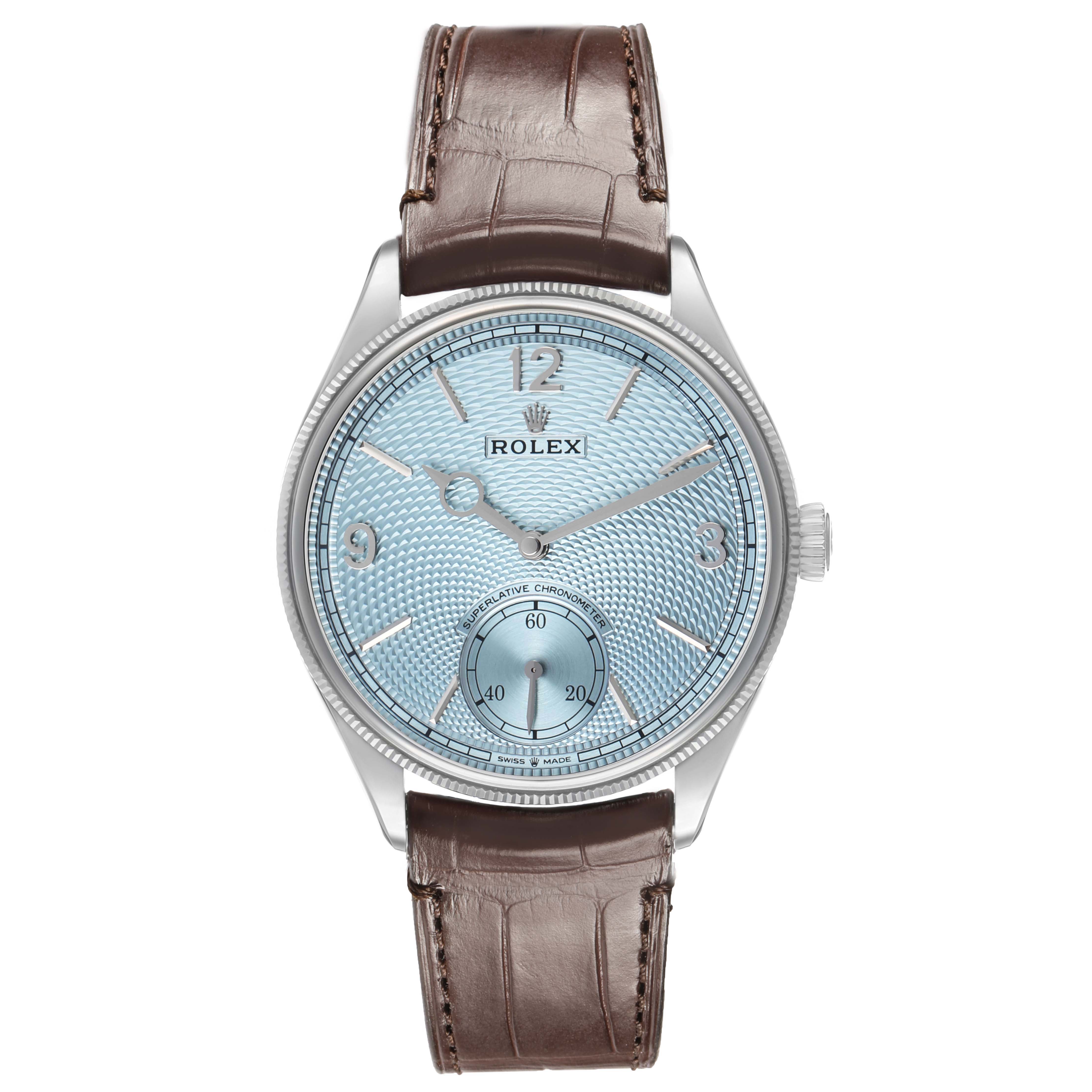 The Rolex 1908 52506 Men's Platinum Blue Dial watch is shown from a front angle, displaying the face, dial, hands, and strap.