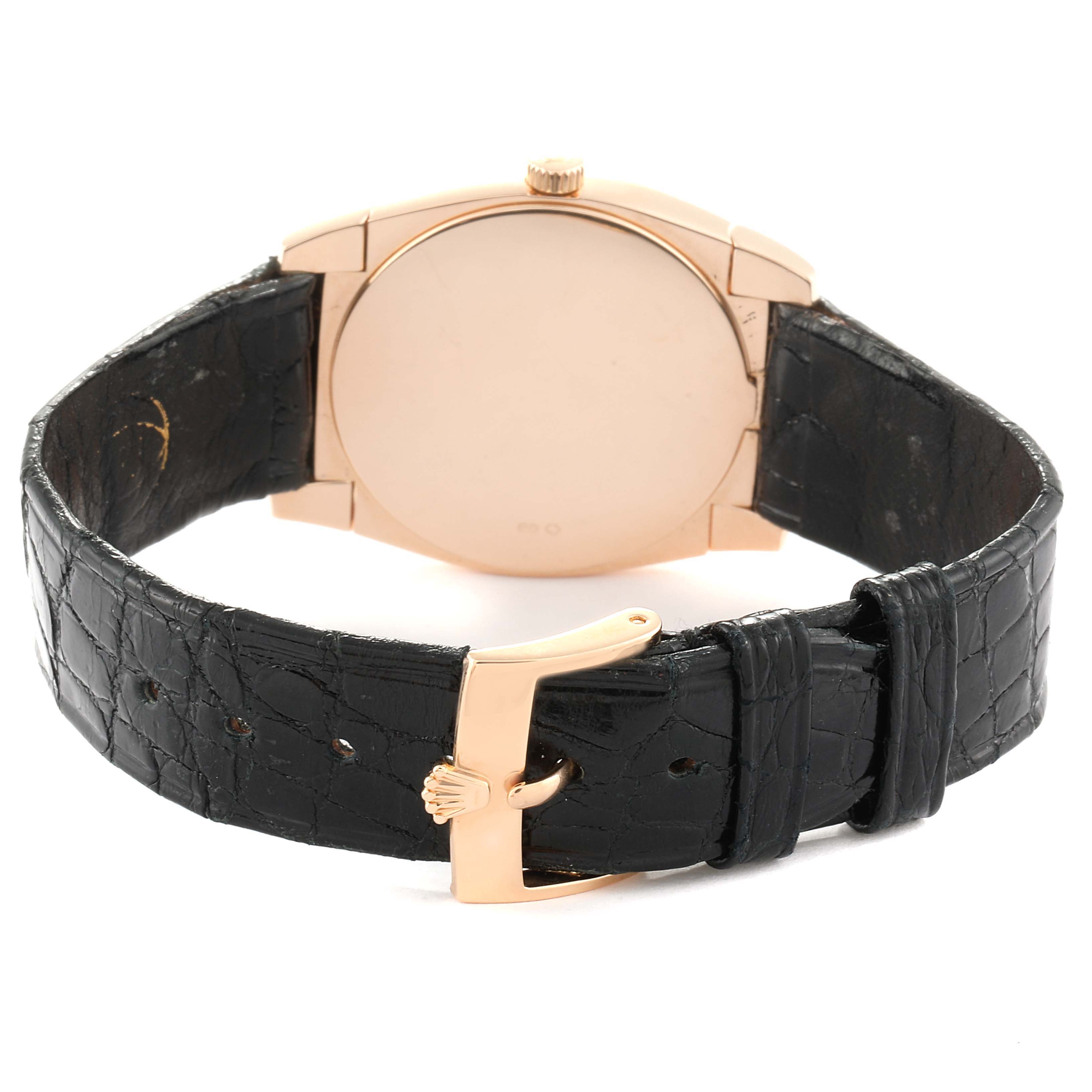 The image shows the back of a Rolex Cellini 5330 Women's Rose Gold Grey Dial 5330 Women's Rose Gold Grey Dial watch, highlighting its case, crown, and black leather strap with a clasp.