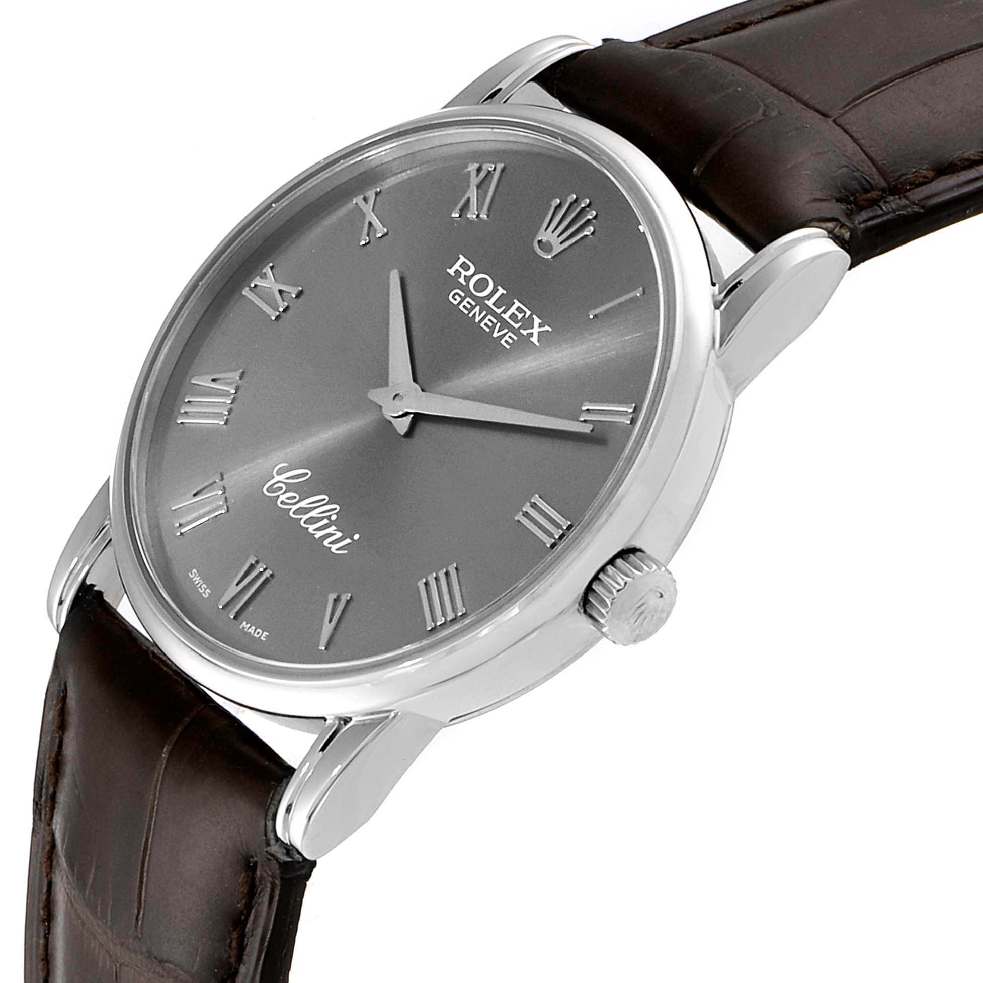 The Rolex Cellini 5116 Men's White Gold Grey Dial 5116 Men's White Gold Grey Dial watch is shown at a slight angle, highlighting the dial, case, crown, and partially the leather strap.