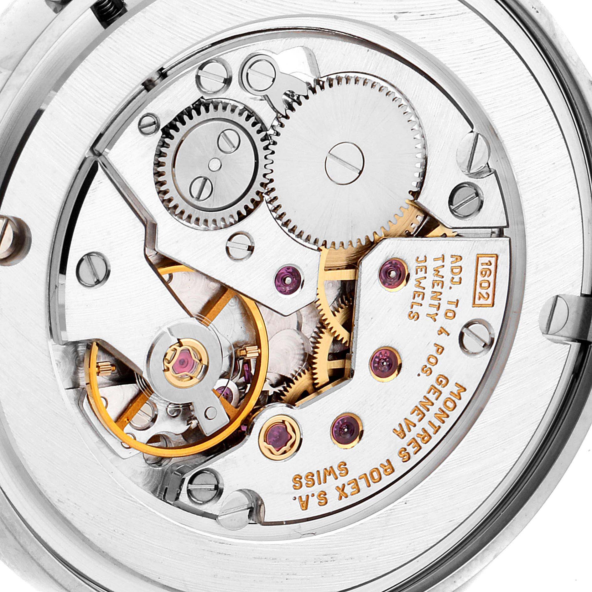 The image shows the movement and gears of a Rolex Cellini 5116 Men's White Gold Grey Dial 5116 Men's White Gold Grey Dial watch from a back angle.