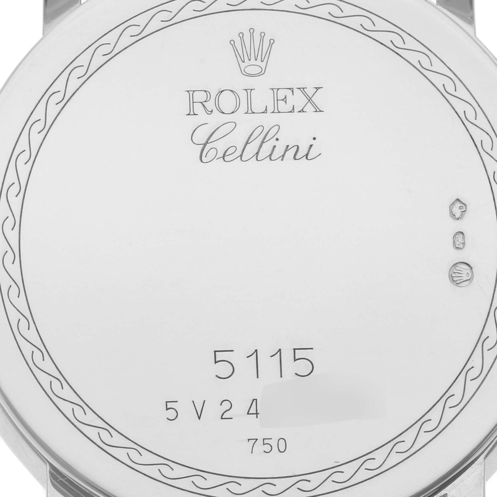 This image shows the case back of a Rolex Cellini 5115 Men's White Gold White Dial 5115 Men's White Gold White Dial model 5115, displaying its engravings and serial numbers.