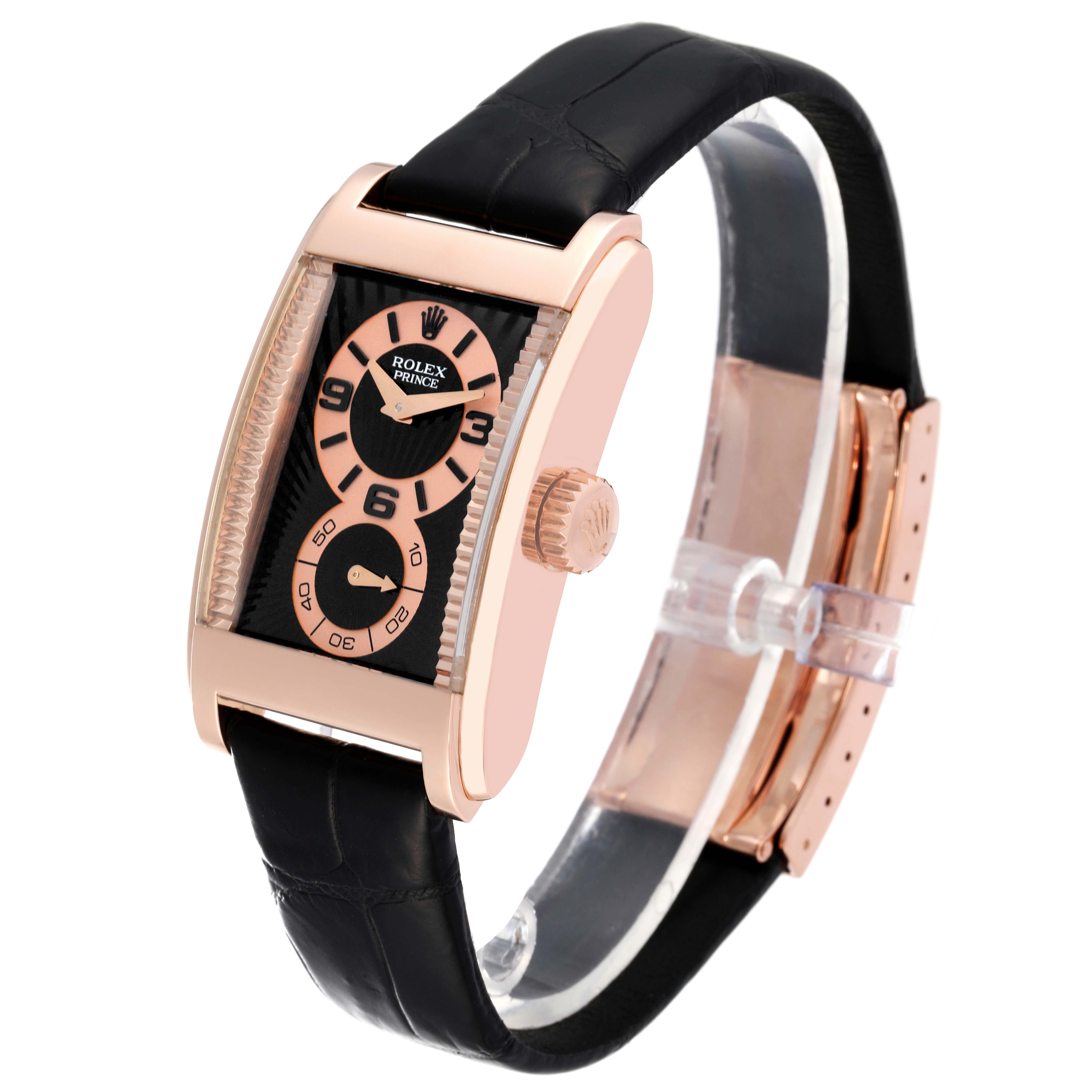 The Rolex Cellini 5442 Men
s Rose Gold Black Dial 5442 Men
s Rose Gold Black Dial watch is shown at a slight side angle, highlighting its rectangular rose gold case, black leather strap, and crown.