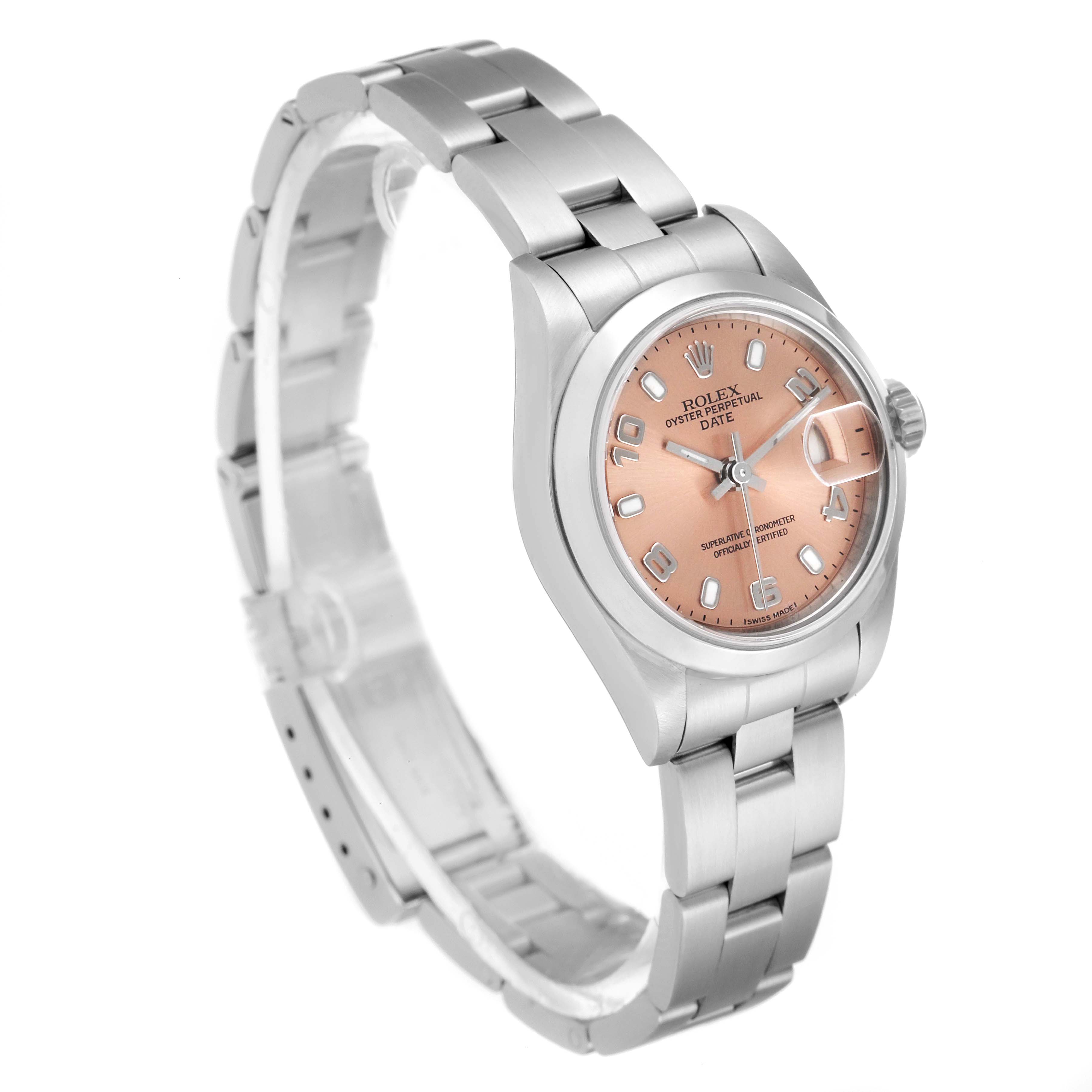 The Rolex Date 79160 Women's Stainless Steel Pink Dial 79160 Women's Stainless Steel Pink Dial model watch is shown at an angled view, displaying its face, dial, bracelet, and clasp.