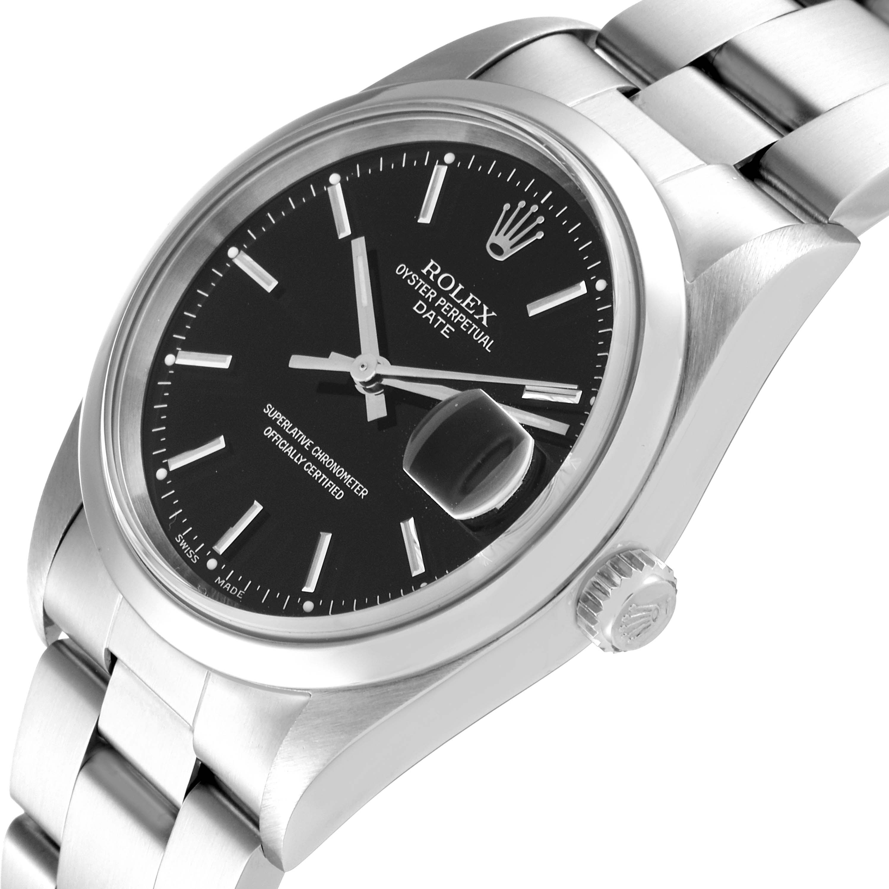 The image shows a Rolex Oyster Perpetual Date watch at an angled view, highlighting the dial, crown, and part of the bracelet.
