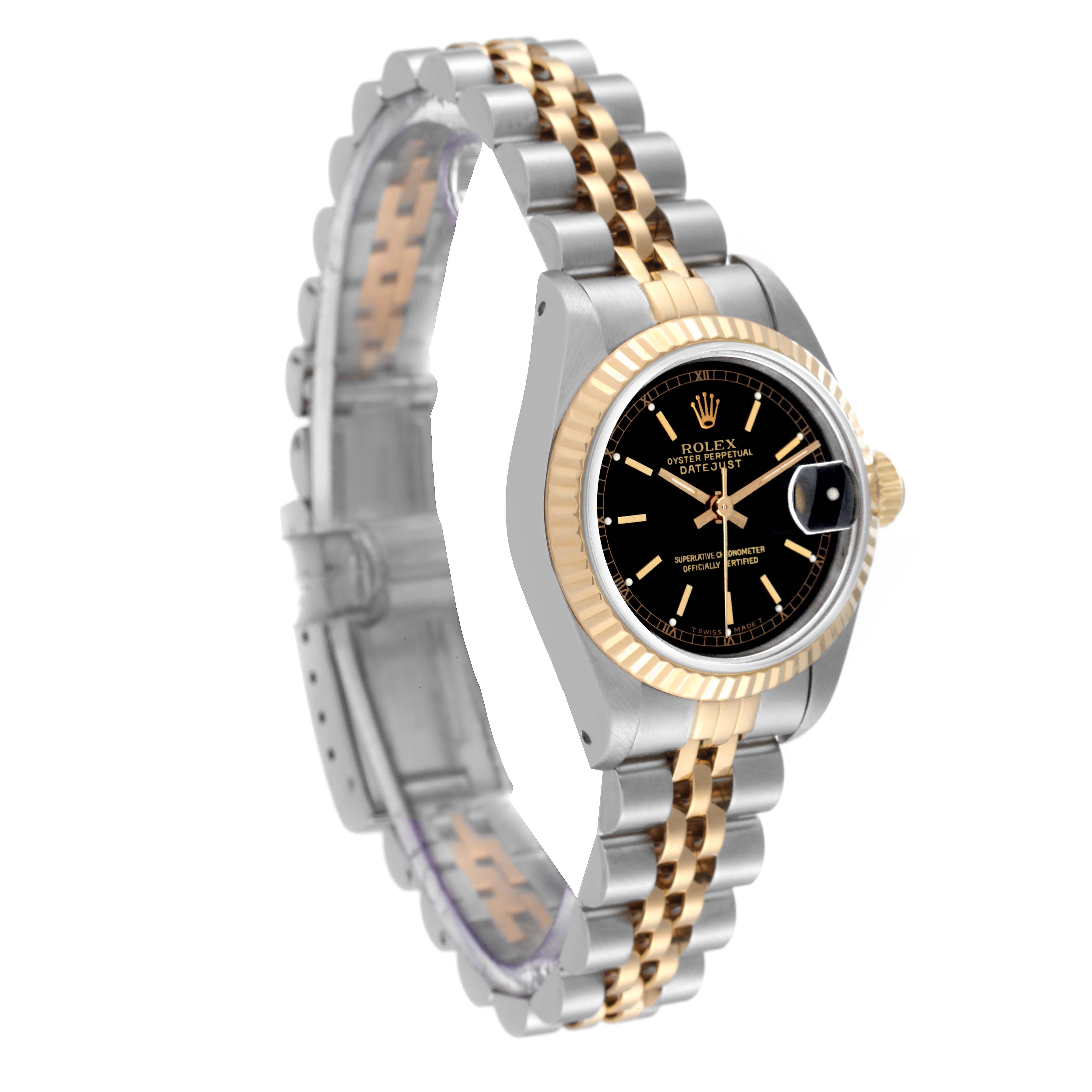This Rolex Datejust 69173 Women's Steel and Gold (two tone) Black Dial 69173 Women's Steel and Gold (two tone) Black Dial watch is shown at a side angle, displaying the two-tone bracelet, black dial, fluted bezel, and date window.