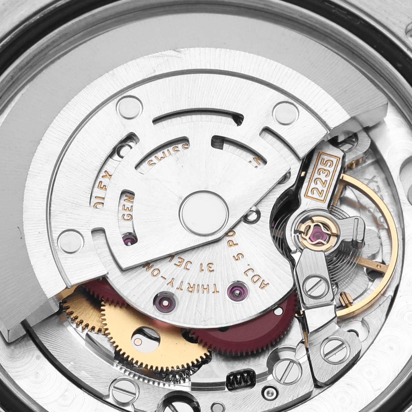 This image shows the inner mechanisms of the Rolex Datejust watch model from a close-up angle, highlighting its movement components.