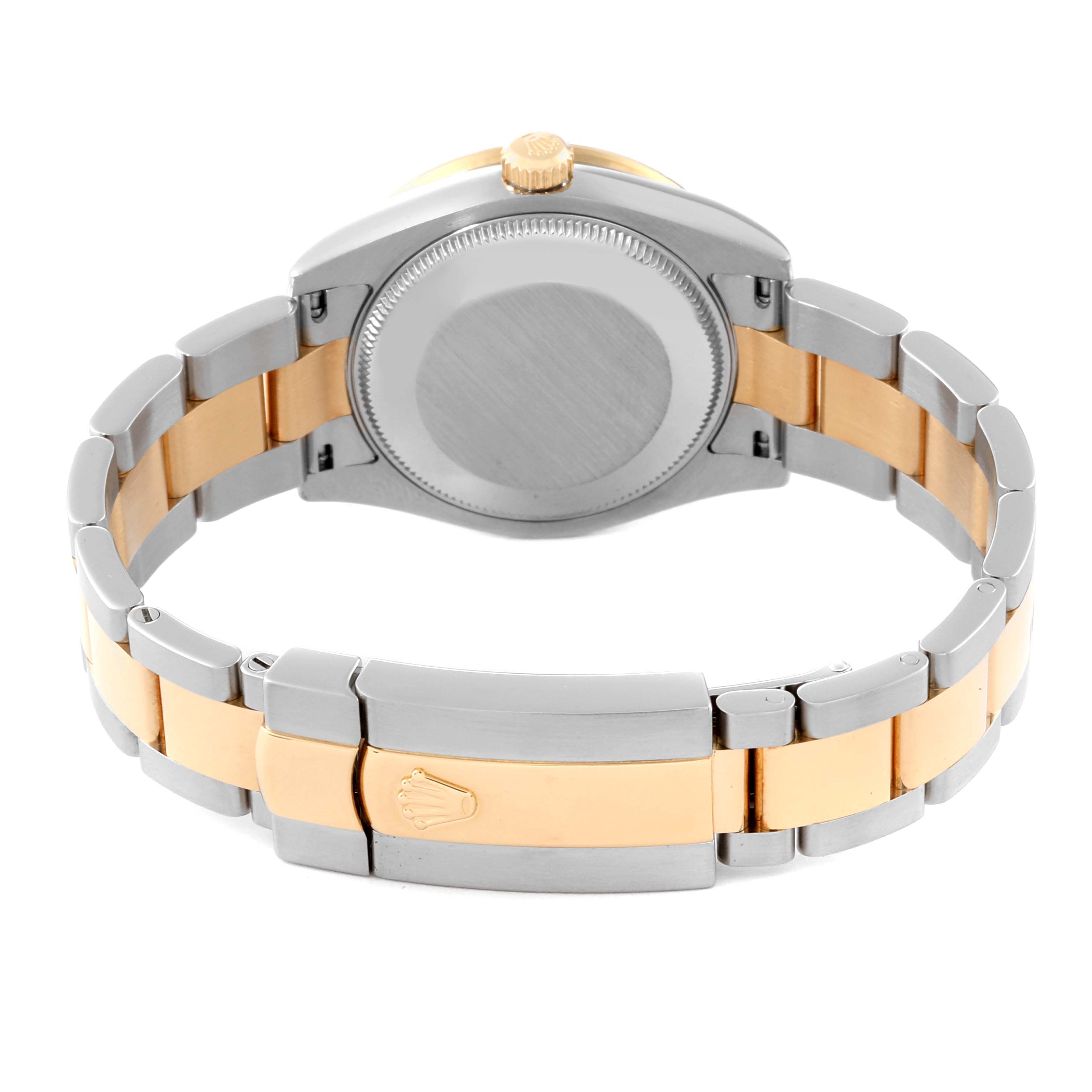 The image shows the back case and bracelet of a Rolex Datejust watch, viewed from the rear angle.