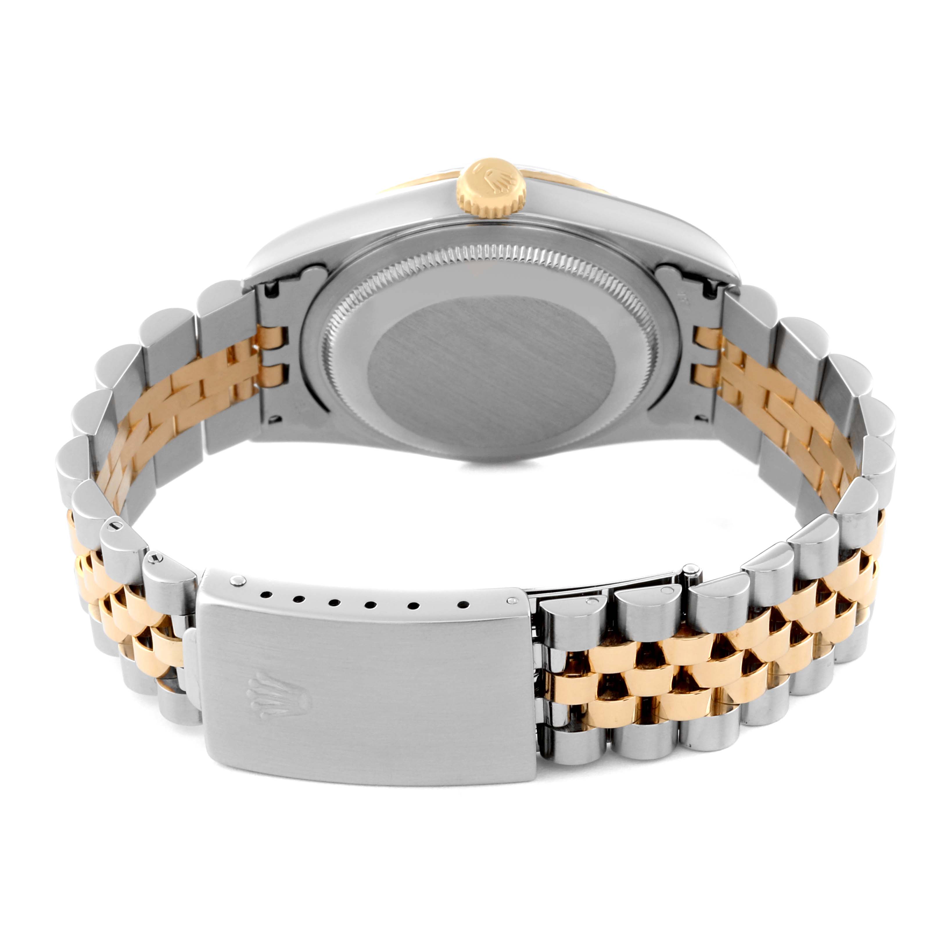 The image shows the back side of a Rolex Datejust 16233 Men's Steel and Gold (two tone) Black Dial 16233 Men's Steel and Gold (two tone) Black Dial watch, highlighting the case, crown, and two-tone metal bracelet with clasp.