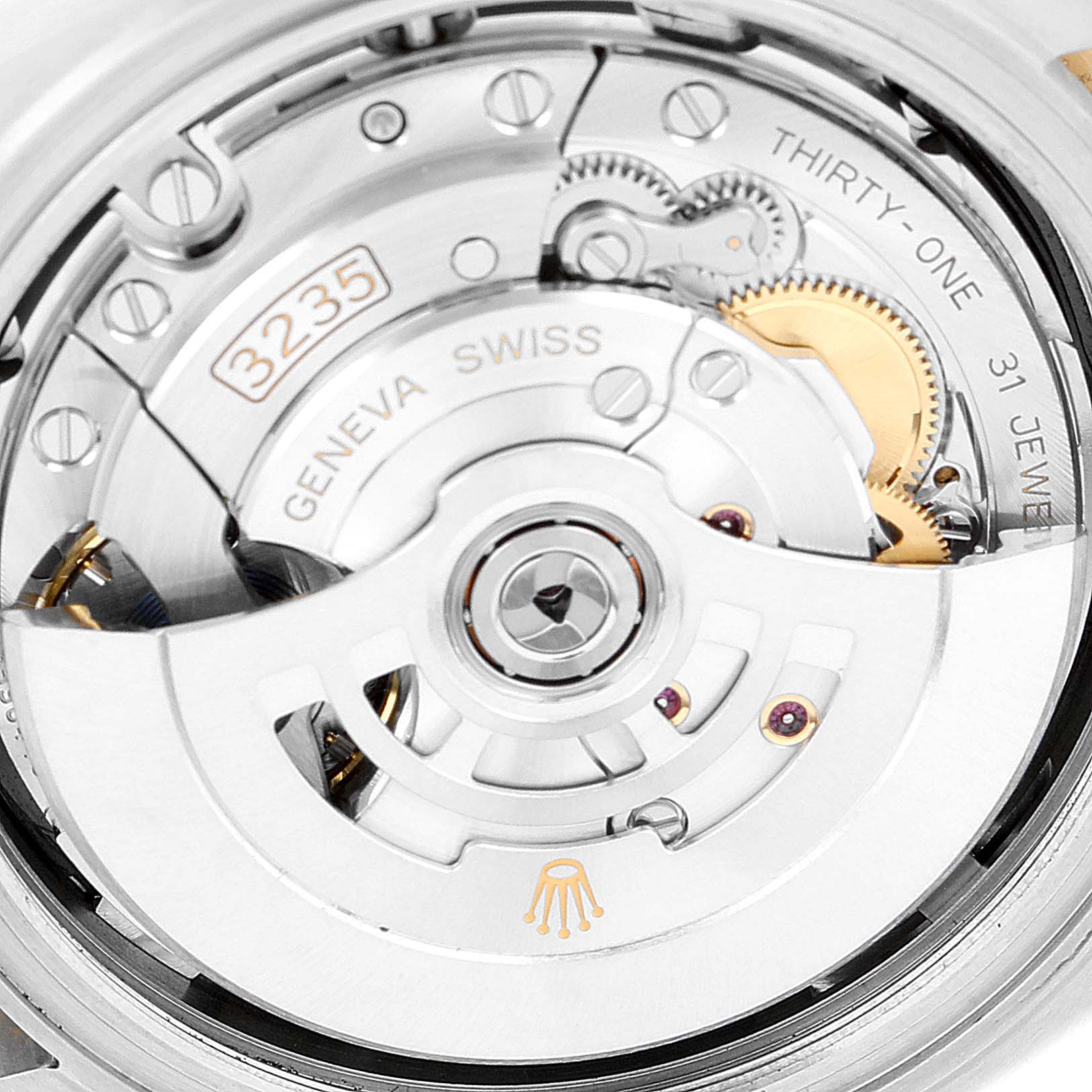 This image shows a close-up of the Rolex Datejust 41 126333 Men's Steel and Gold (two tone) Black Dial 126333 Men's Steel and Gold (two tone) Black Dial movement, highlighting the intricate gears and rotor.