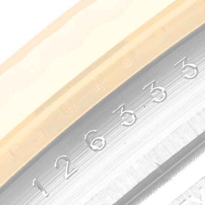 This image shows a close-up of the date wheel from a Rolex Datejust 41 126333 Men's Steel and Gold (two tone) Black Dial 126333 Men's Steel and Gold (two tone) Black Dial model.