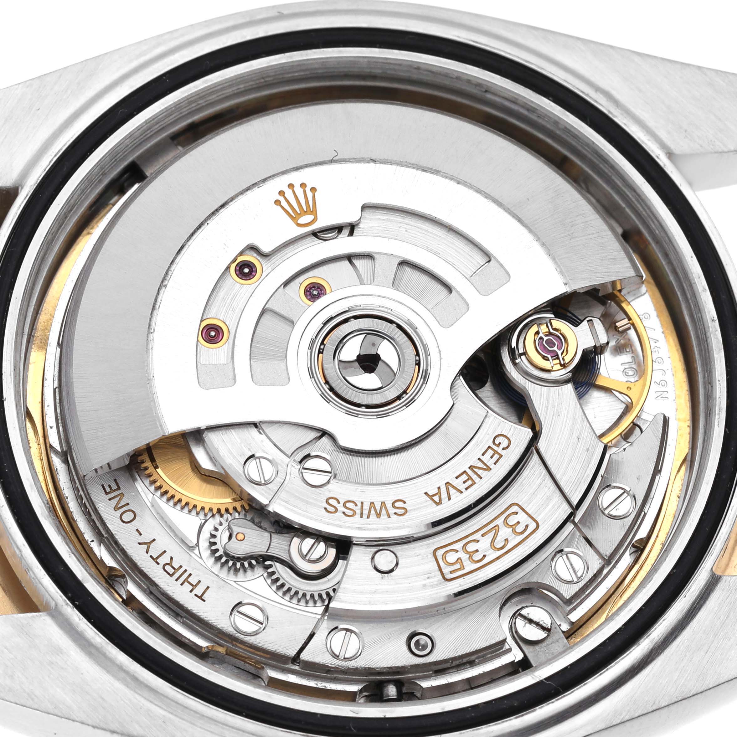 This image shows the intricate movement mechanism of a Rolex Datejust 41 M126333-0011 Men's Steel and Gold (two tone) Champagne Dial M126333-0011 Men's Steel and Gold (two tone) Champagne Dial watch, viewed from the back.
