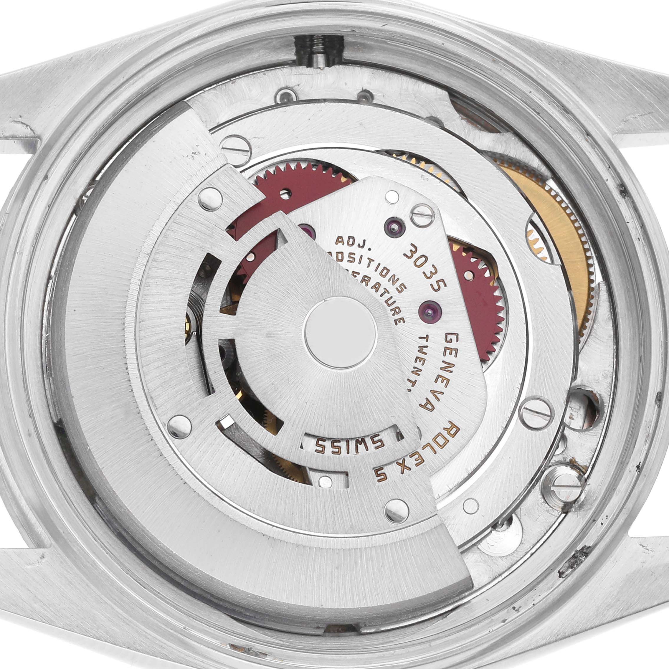 The image shows the movement from a top-down view of a Rolex Datejust 16030 Men
s Stainless Steel Silver Dial 16030 Men
s Stainless Steel Silver Dial watch, highlighting the rotor and internal mechanics.