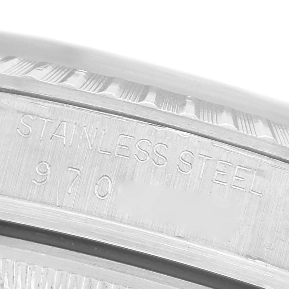 This image shows a close-up of the side of a Rolex Datejust 16030 Men
s Stainless Steel Silver Dial 16030 Men
s Stainless Steel Silver Dial watch, highlighting the material and model number engraving.