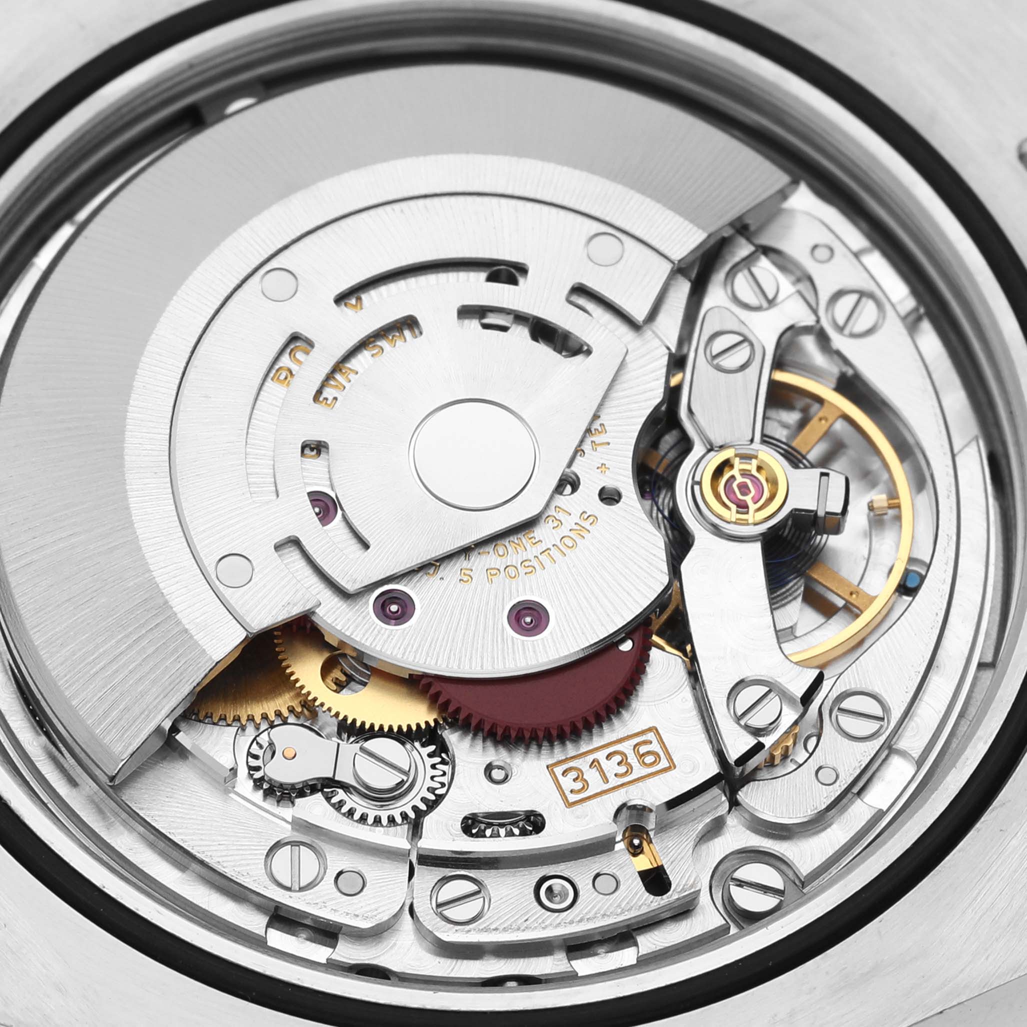 The image shows a close-up of the movement and inner components of a Rolex Datejust 116300 Men
s Stainless Steel Silver Dial 116300 Men
s Stainless Steel Silver Dial watch.