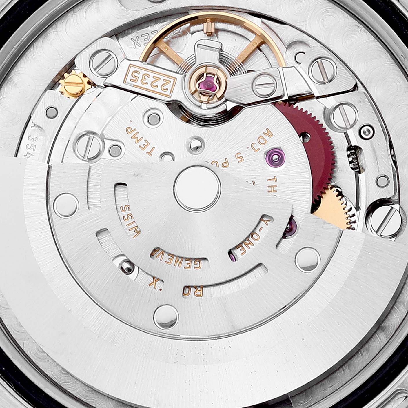 The image shows a close-up of the internal mechanical movement of a Mid-Size Rolex watch.
