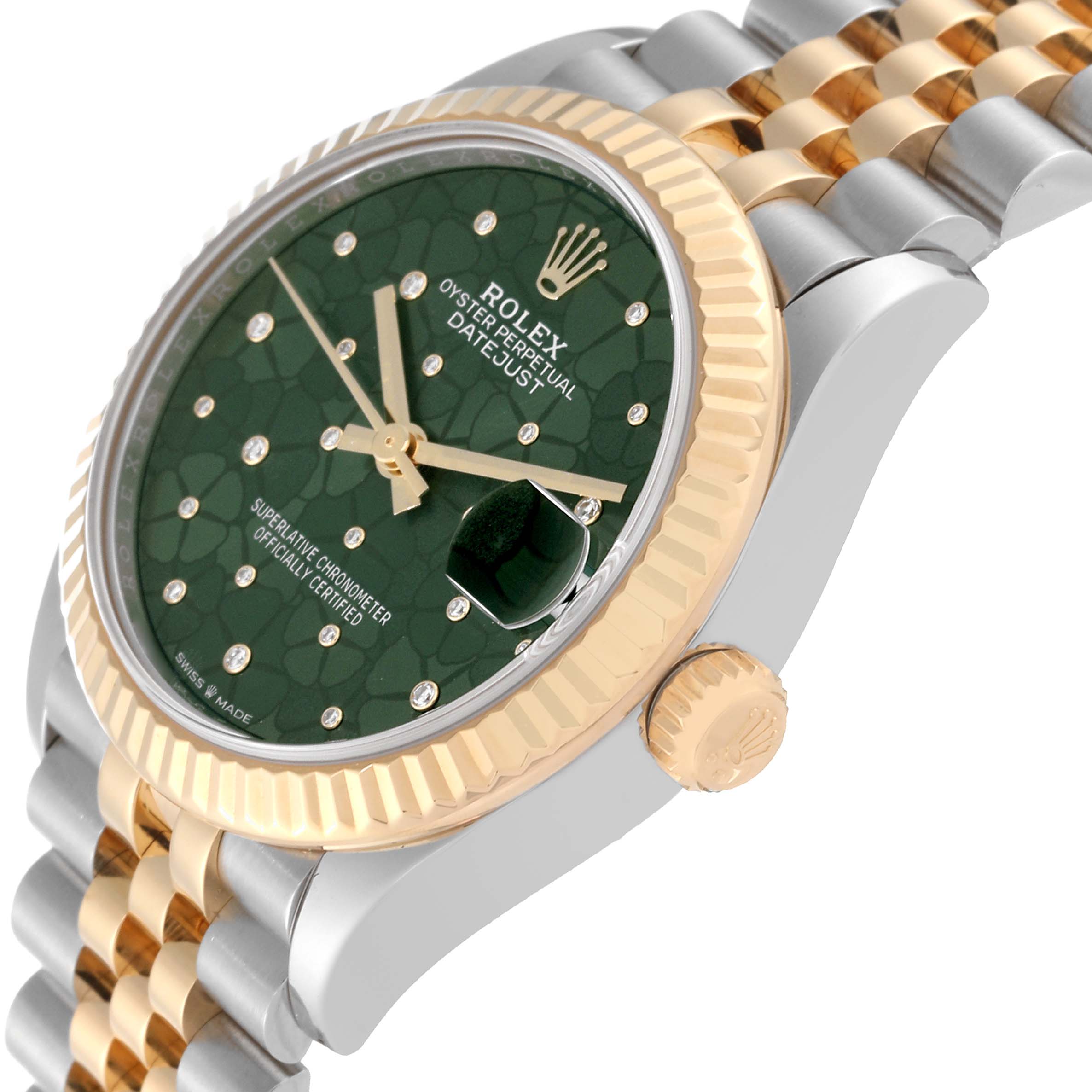 The image shows a close-up side view of the Rolex Mid-Size 278273 Women's Steel and Gold (two tone) Green Dial 278273 Women's Steel and Gold (two tone) Green Dial Datejust watch, featuring its crown, bezel, and part of the bracelet.