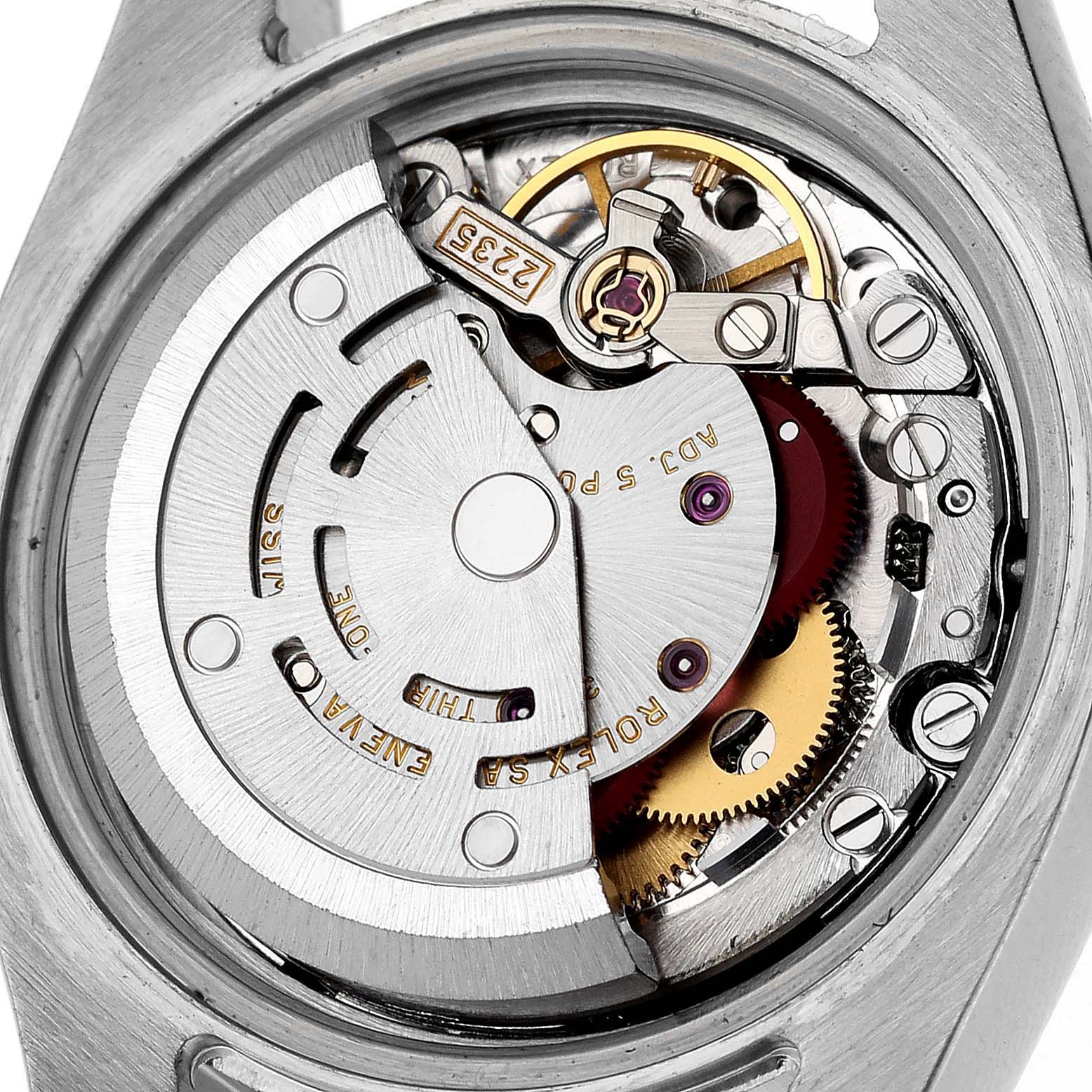 The image shows the inner mechanics of a Rolex Datejust 179163 Women's Steel and Gold (two tone) Silver Dial 179163 Women's Steel and Gold (two tone) Silver Dial model from a straight-on angle, highlighting its movement components.