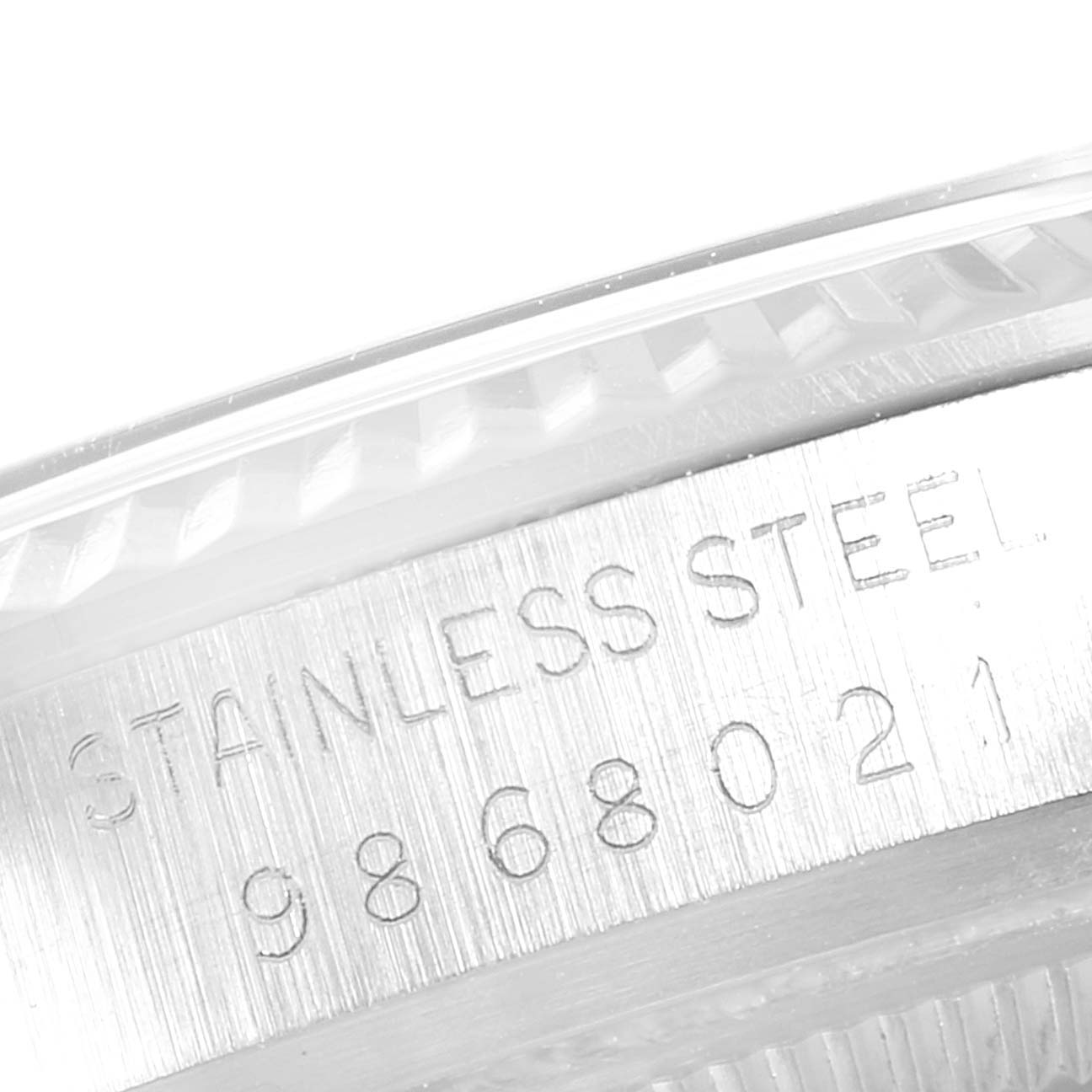 This image shows a close-up of the side engraving on a stainless steel Rolex Vintage Collection 16014 Men
s Stainless Steel Silver Dial 16014 Men
s Stainless Steel Silver Dial watch.