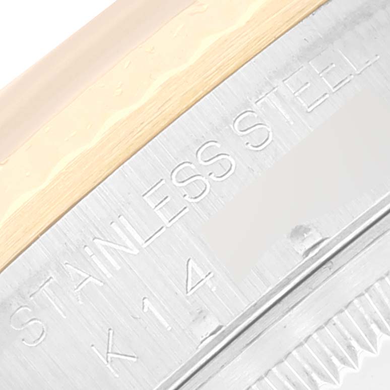 This image shows a close-up of the case back and the engraved stainless steel marking of the Rolex Datejust 16233 Men's Steel and Gold (two tone) Champagne Dial 16233 Men's Steel and Gold (two tone) Champagne Dial watch.