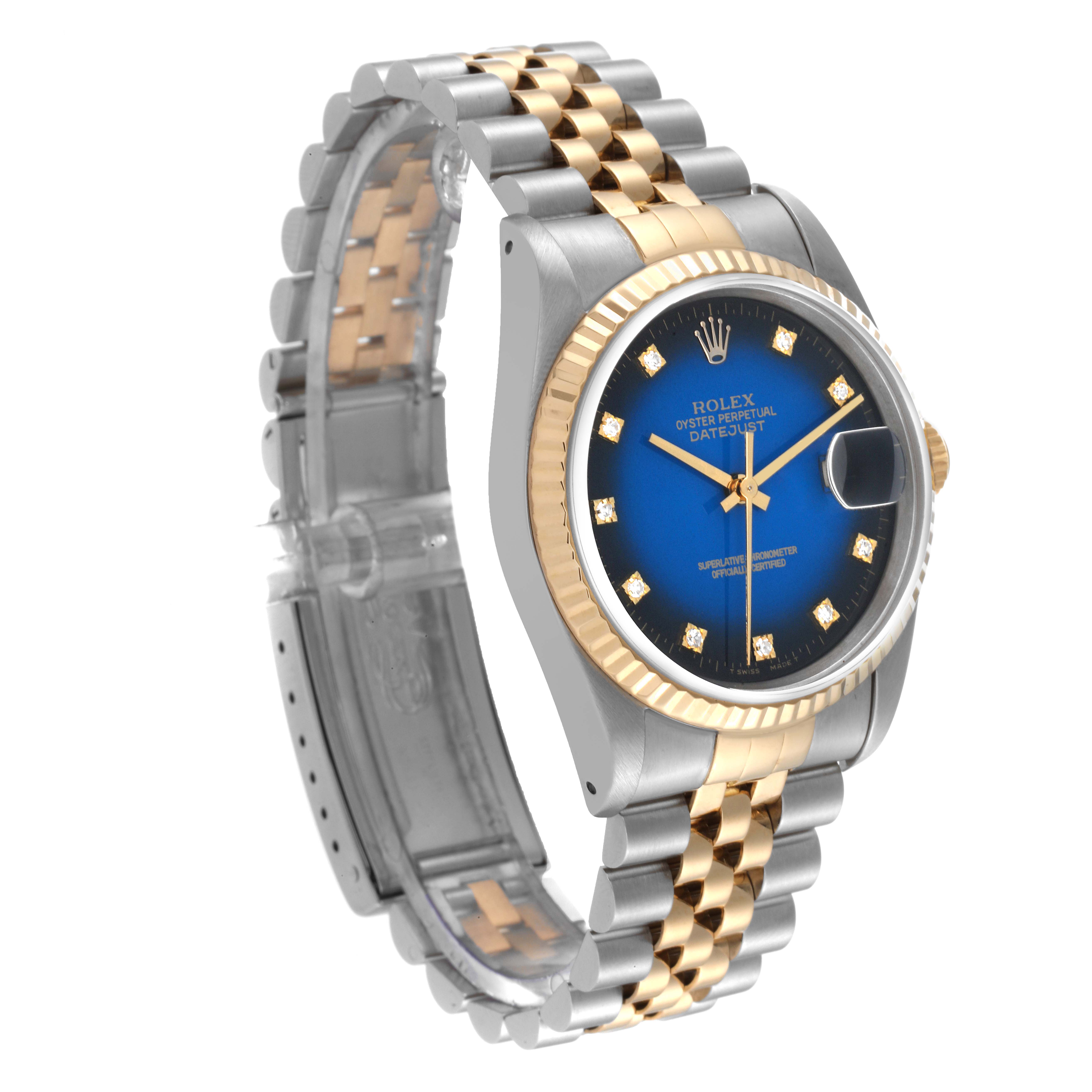 The image shows a side view of the Rolex Datejust 16233 Men's Steel and Gold (two tone) Blue Dial 16233 Men's Steel and Gold (two tone) Blue Dial watch, highlighting its face, bezel, and metal bracelet.
