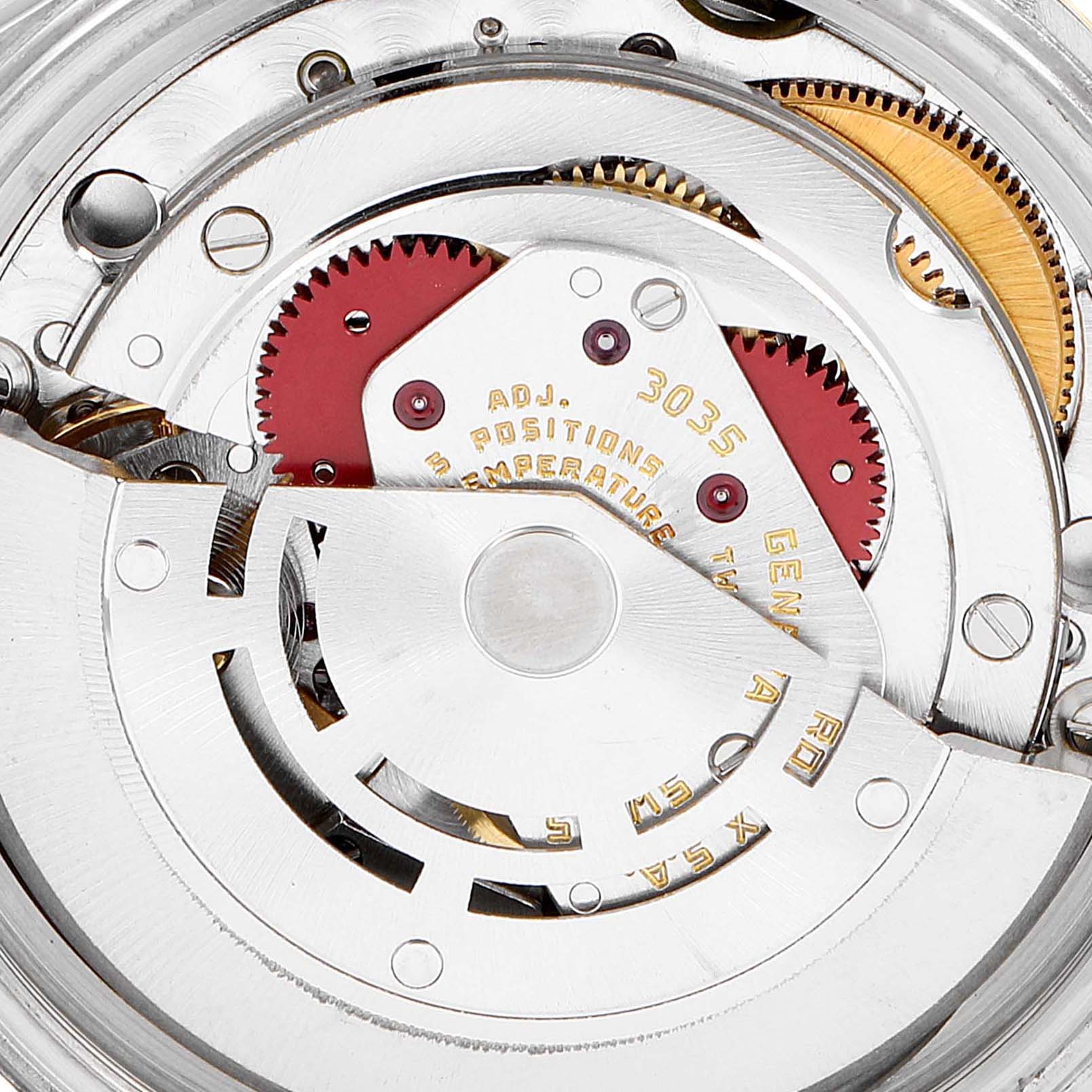 The image shows a close-up of the internal mechanism of the Rolex Vintage Collection 16013 Men's Steel and Gold (two tone) Champagne Dial 16013 Men's Steel and Gold (two tone) Champagne Dial model, showcasing gears and other components.