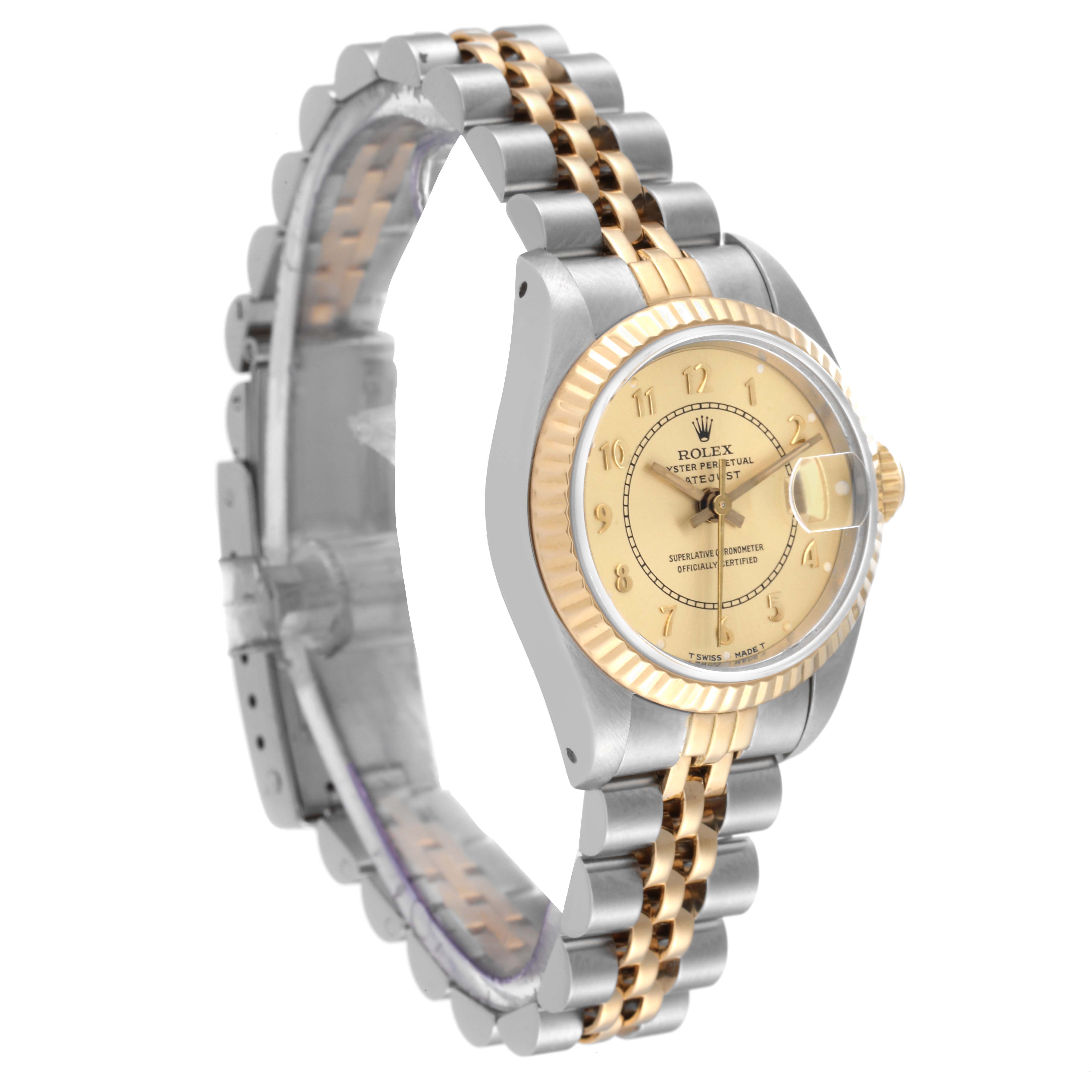 The image shows a Rolex Datejust 69173 Women's Steel and Gold (two tone) Champagne Dial 69173 Women's Steel and Gold (two tone) Champagne Dial watch from a side perspective, highlighting its two-tone bracelet, fluted bezel, and champagne dial.