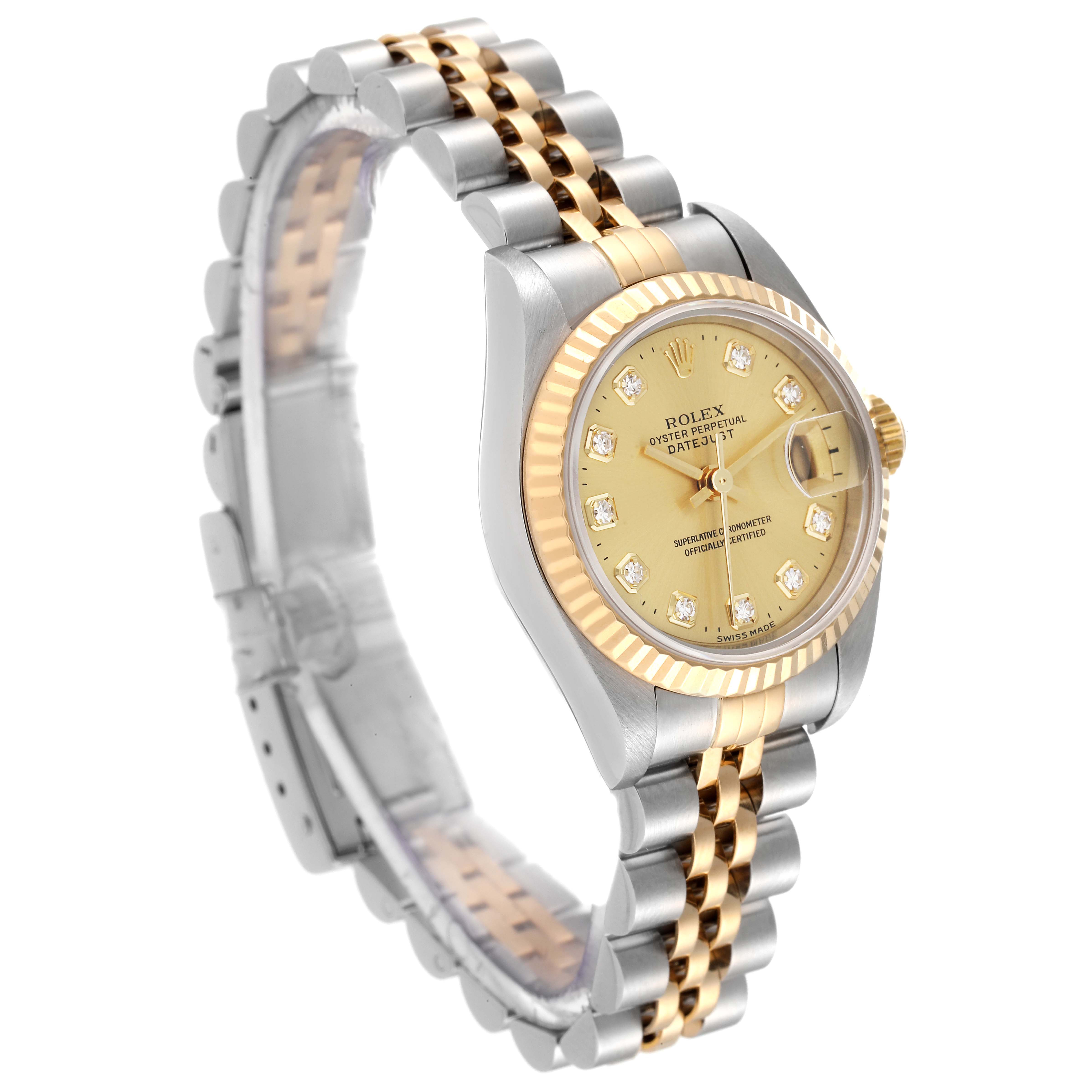 The image shows a three-quarter angled view of a Rolex Datejust 79173 Women's Steel and Gold (two tone) Champagne Dial 79173 Women's Steel and Gold (two tone) Champagne Dial watch with a two-tone metal band and a diamond-studded dial.