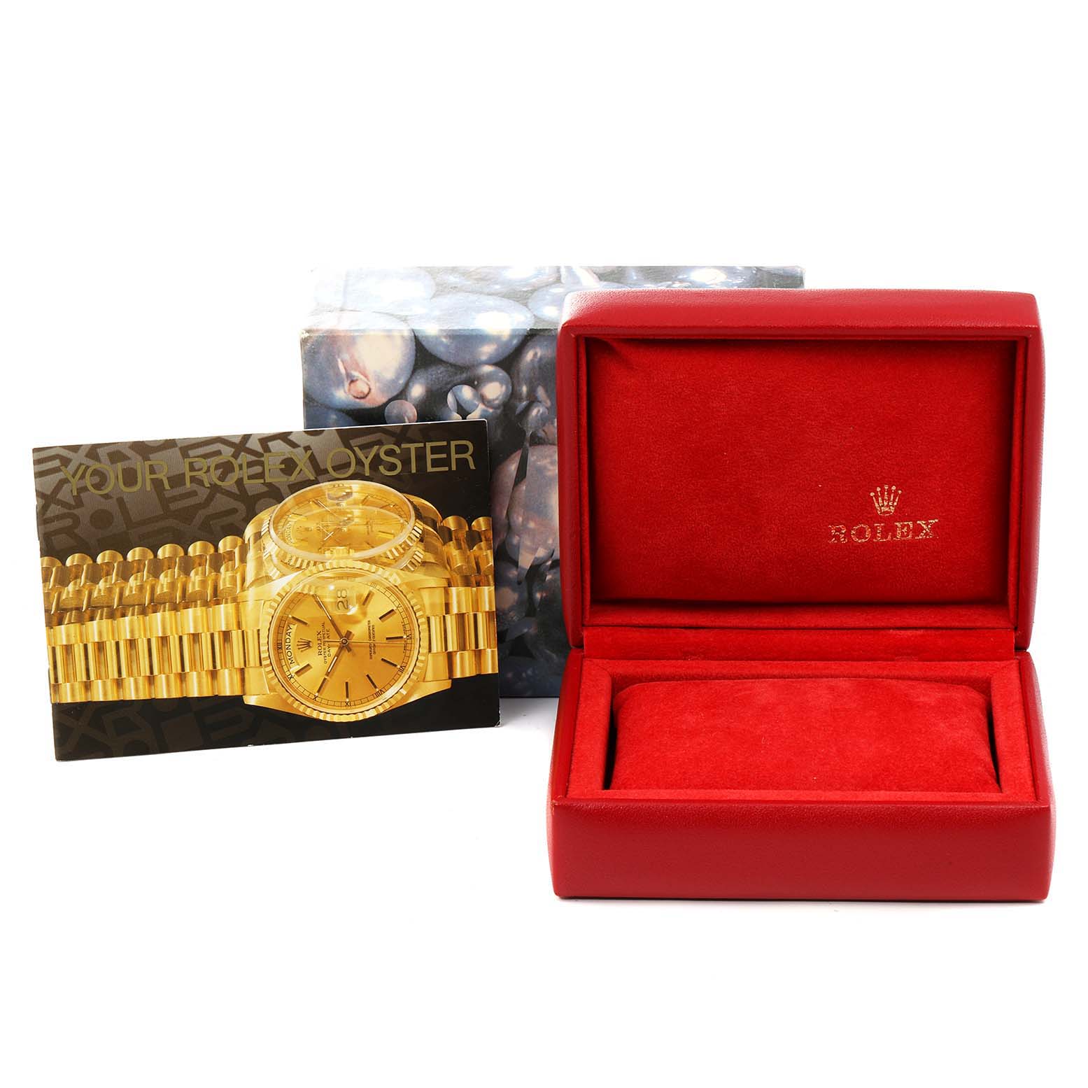 The image shows a Rolex Datejust 79163 Women's Steel and Gold (two tone) Grey Dial 79163 Women's Steel and Gold (two tone) Grey Dial watch brochure, an open red Rolex box, and an outer box with a pearl design.