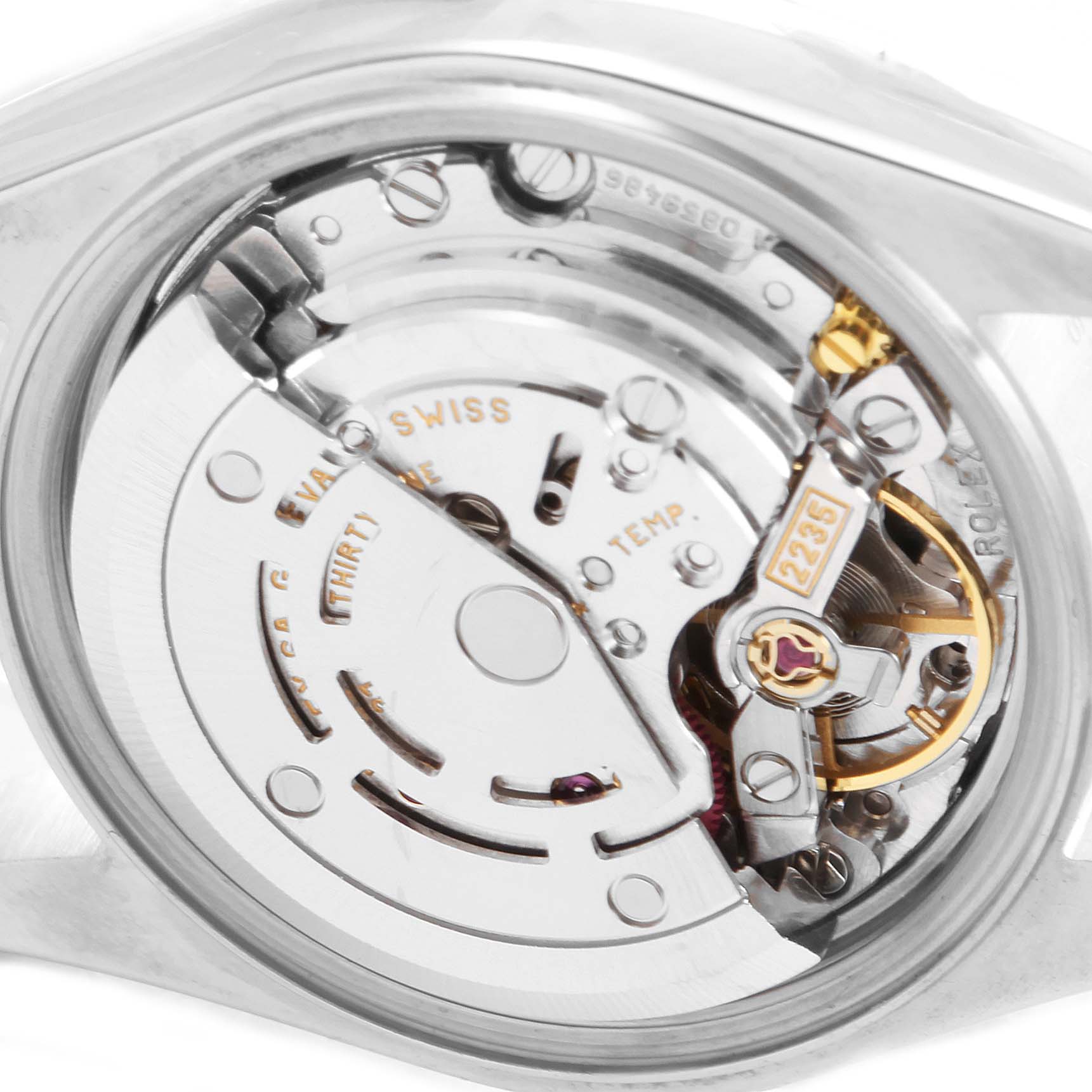 This image shows a close-up view of the Rolex Datejust 79163 Women's Steel and Gold (two tone) Grey Dial 79163 Women's Steel and Gold (two tone) Grey Dial model's movement from the case back angle.