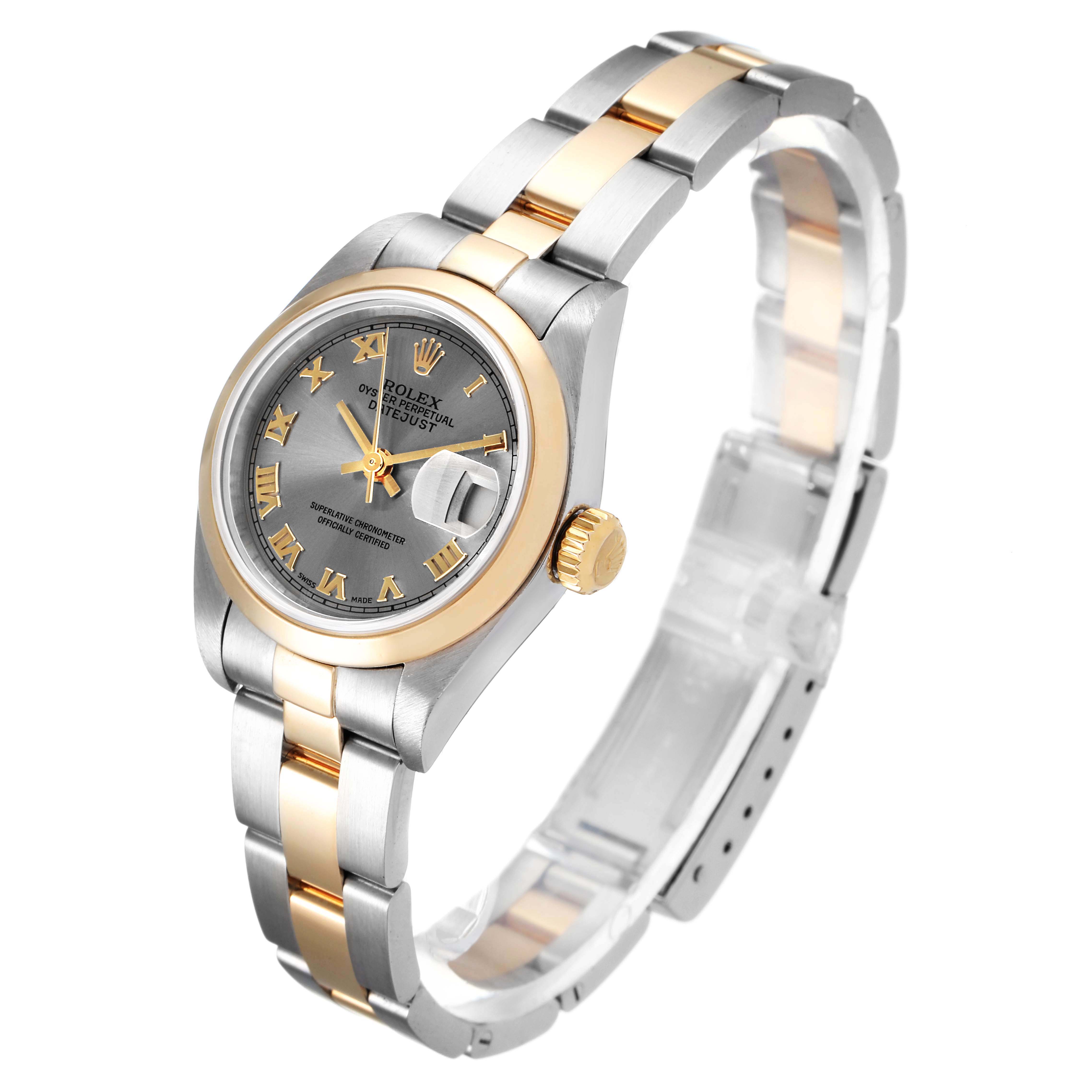 The Rolex Datejust 79163 Women's Steel and Gold (two tone) Grey Dial 79163 Women's Steel and Gold (two tone) Grey Dial watch is shown in a three-quarter angle, displaying the dial, bracelet, and crown.