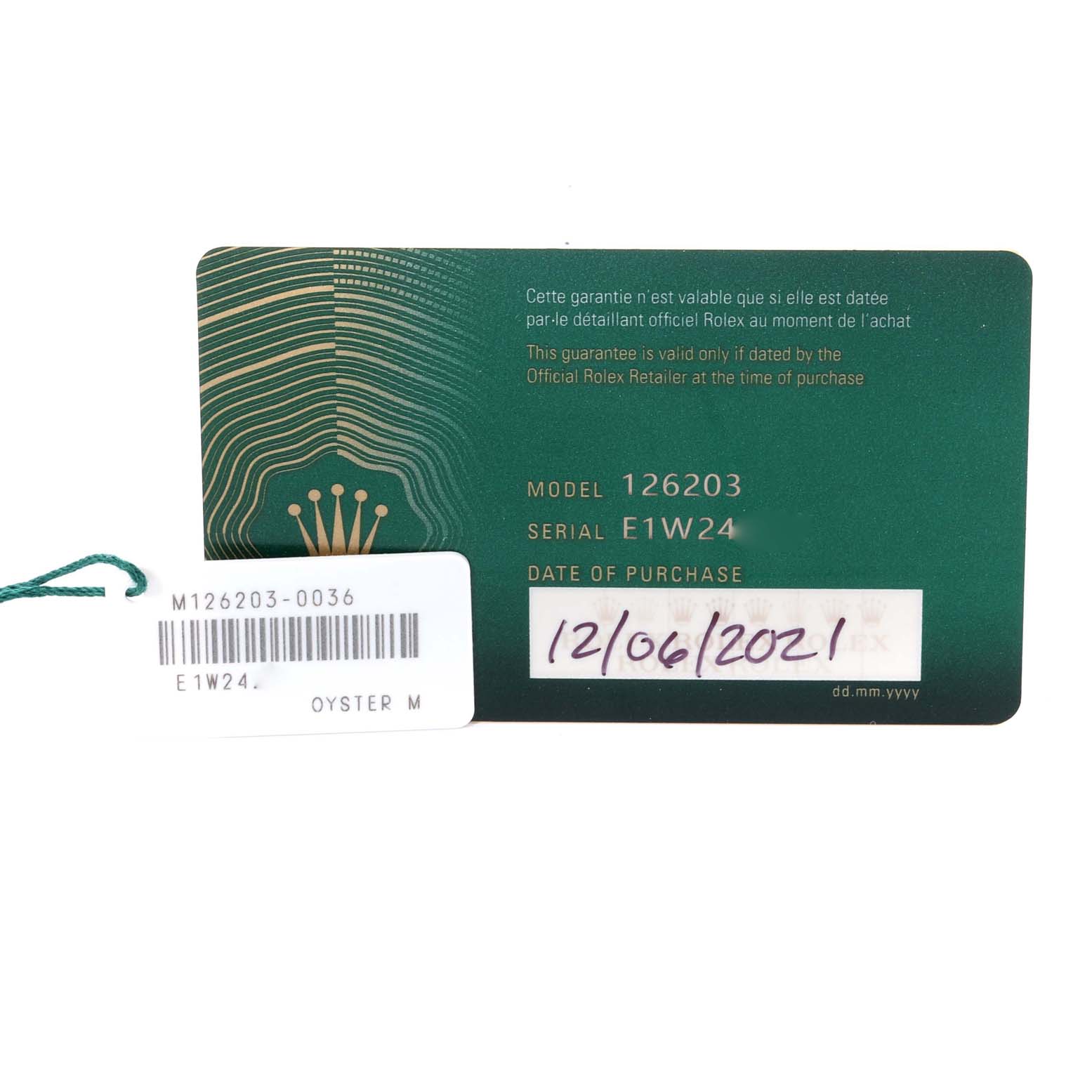 The image shows the official guarantee card and tag for a Rolex Datejust 126203 Men
s Steel and Gold (two tone) Grey Dial 126203 Men
s Steel and Gold (two tone) Grey Dial model 126203.